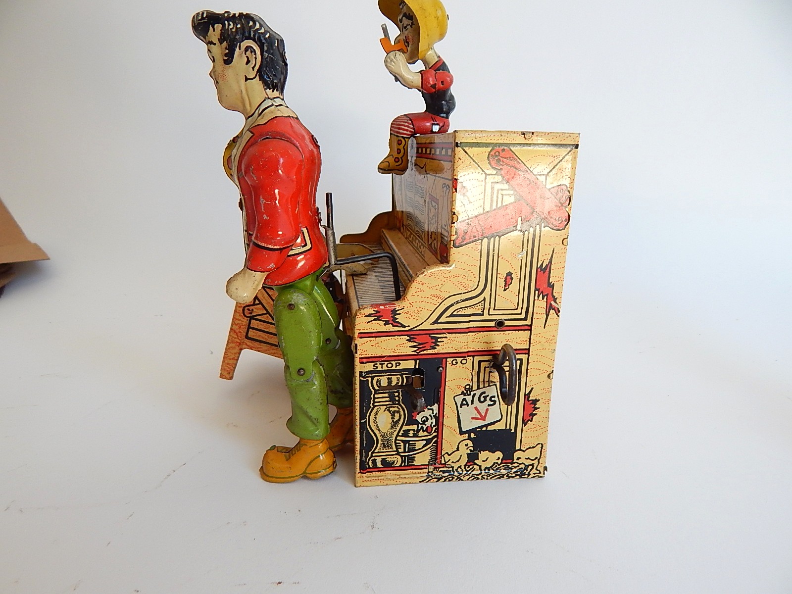 1945 "Li'l Abner" Dogpatch Band Tin Wind-Up Musical Toy by Unique Art Mfg. Co.