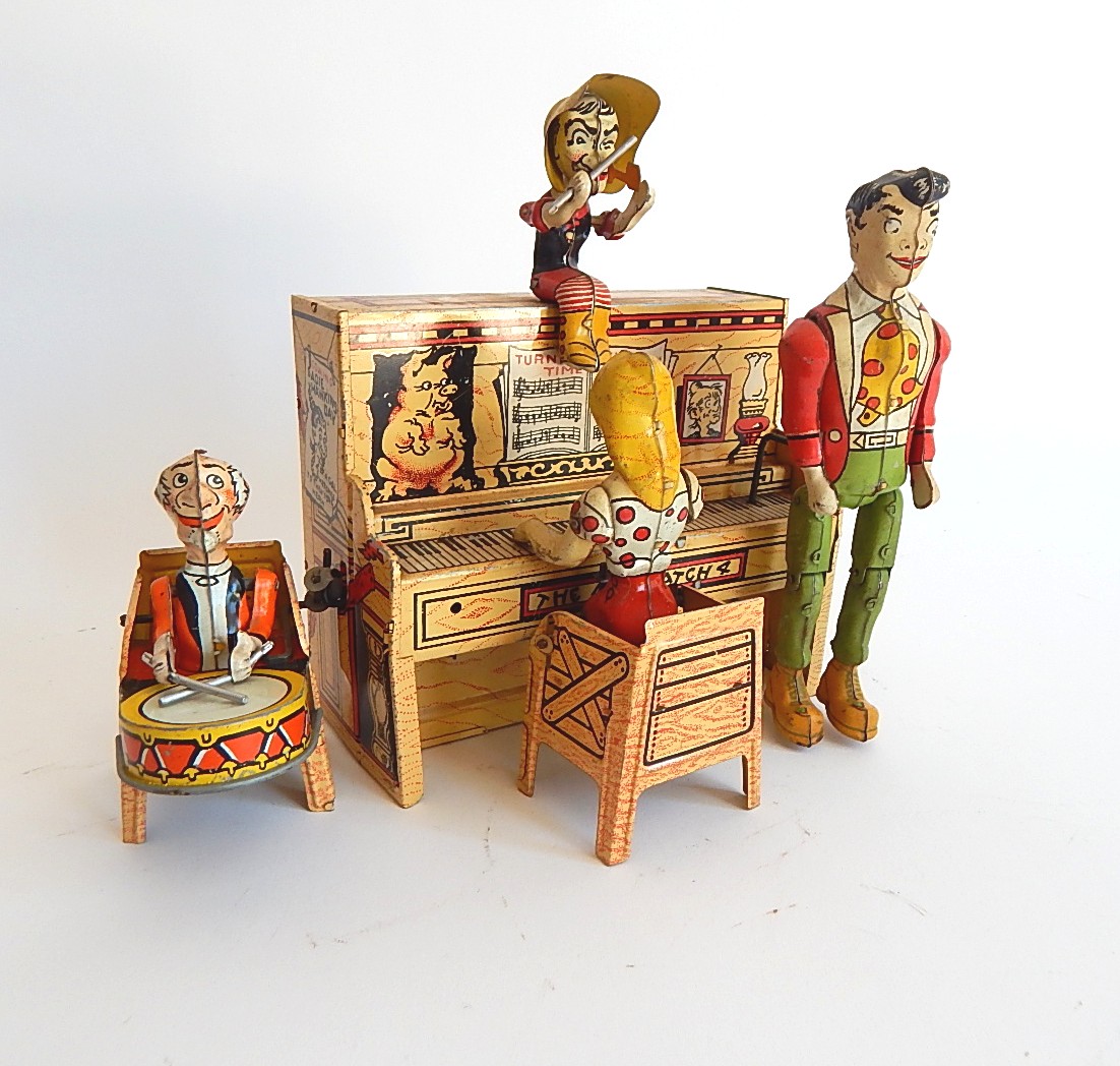 1945 "Li'l Abner" Dogpatch Band Tin Wind-Up Musical Toy by Unique Art Mfg. Co.