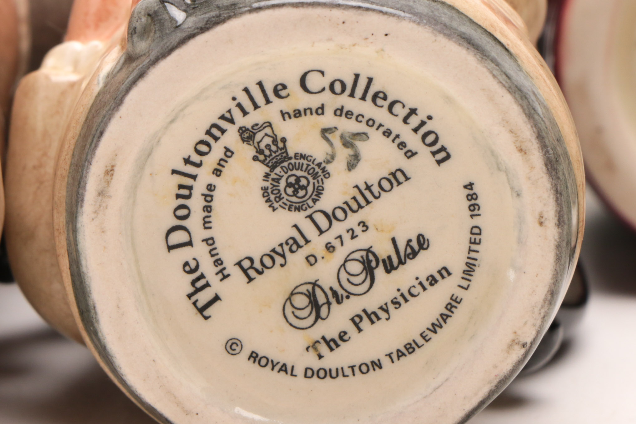 Group of Royal Doulton "The Doultonville Collection" Toby Jugs