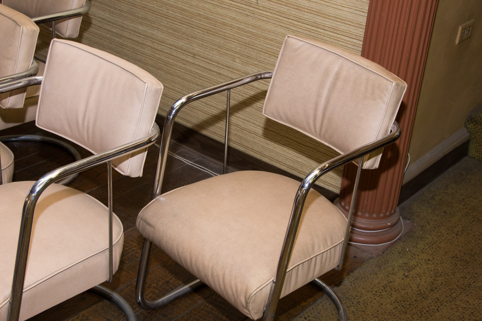 Four Mid Century Modern Vinyl and Chrome Chairs