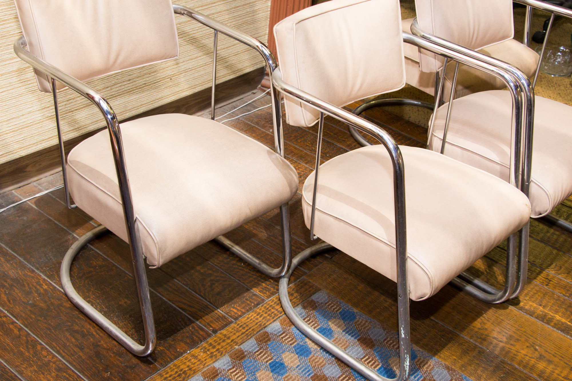 Four Mid Century Modern Vinyl and Chrome Chairs