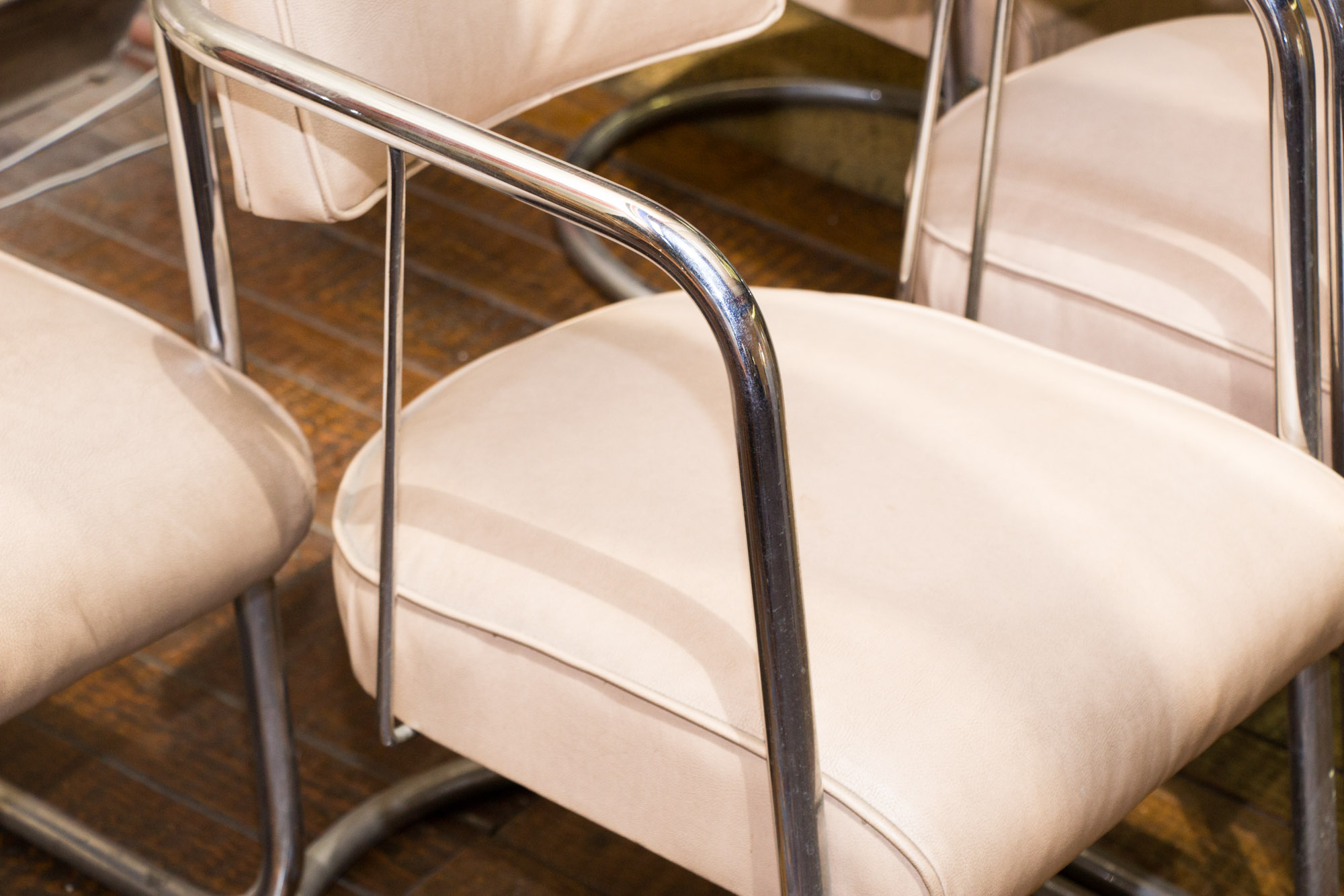 Four Mid Century Modern Vinyl and Chrome Chairs