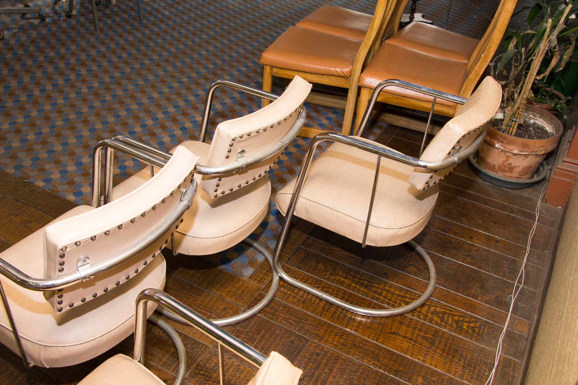 Four Mid Century Modern Vinyl and Chrome Chairs