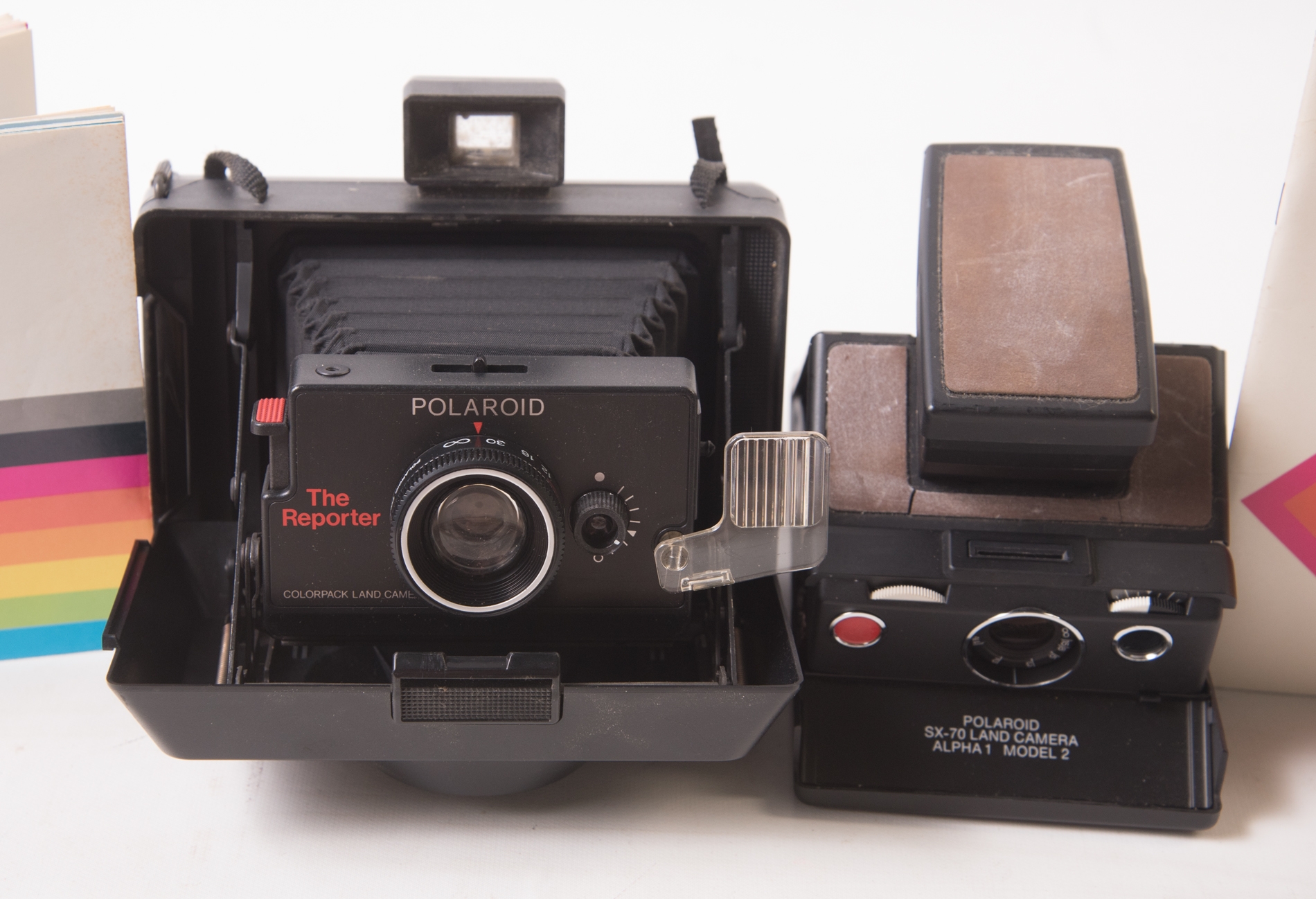 Vintage Polaroid SX-70 Land Camera And a Polaroid "Reporter" Land Camera