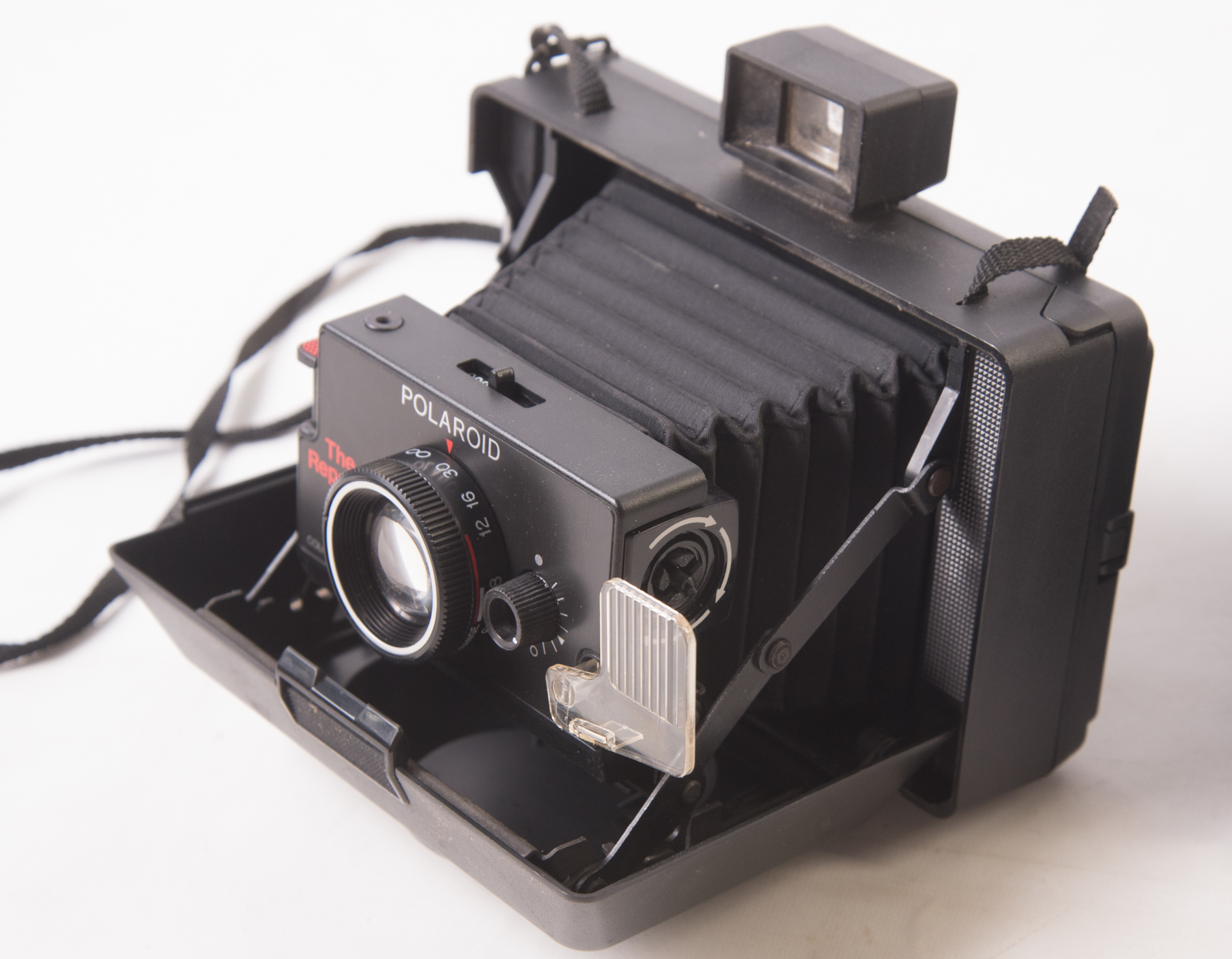 Vintage Polaroid SX-70 Land Camera And a Polaroid "Reporter" Land Camera