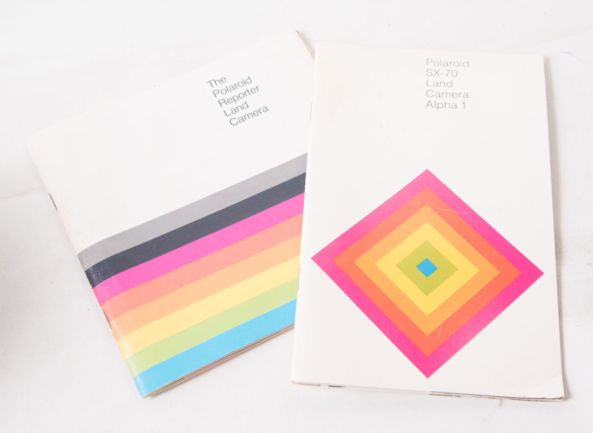 Vintage Polaroid SX-70 Land Camera And a Polaroid "Reporter" Land Camera