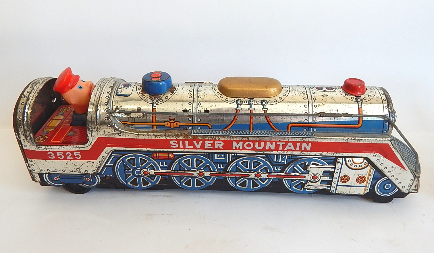 Vintage Tin Toy Collection with Silver Mountain, Disney Casey Jr.