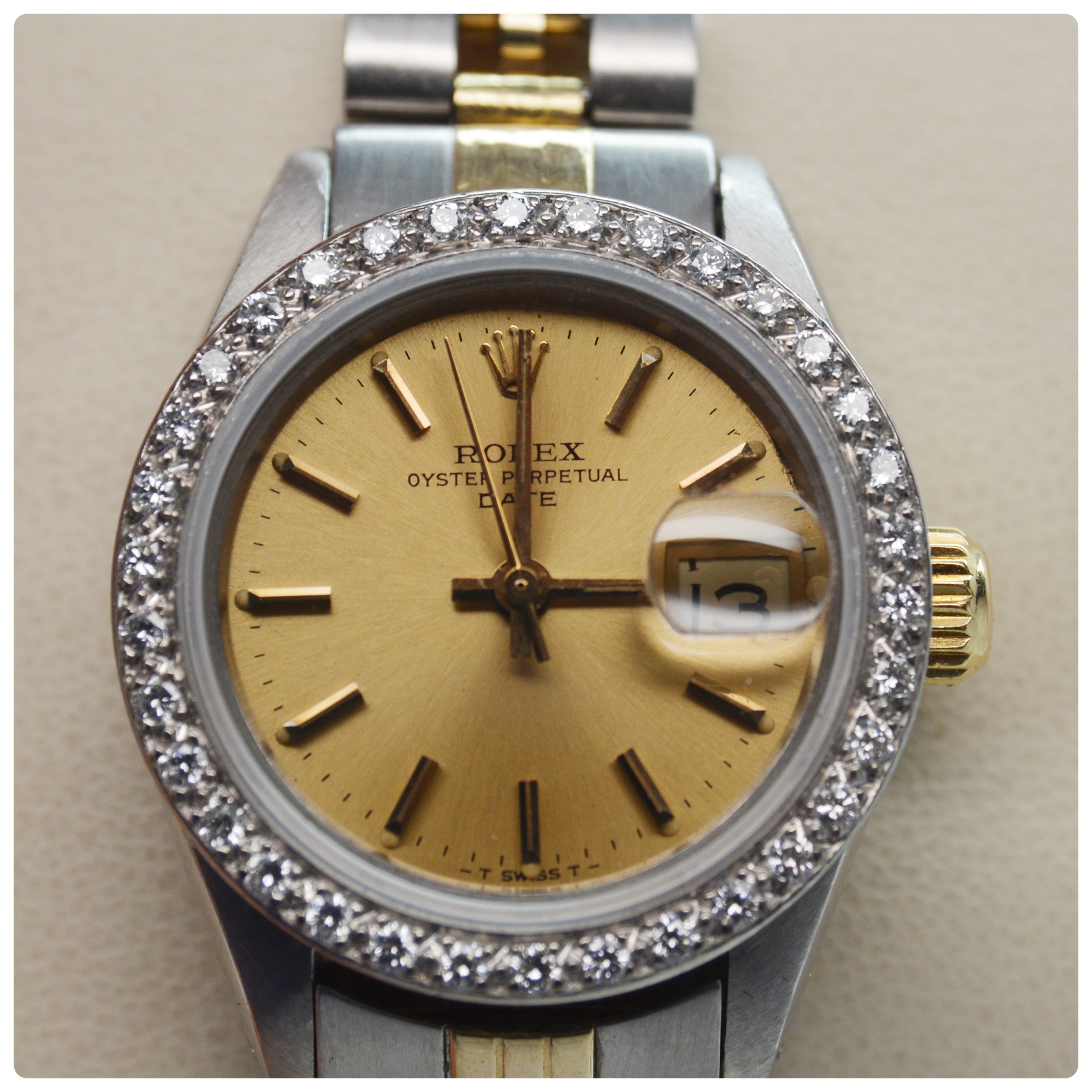 Rolex Oyster Perpetual Date Diamond Bezel Watch