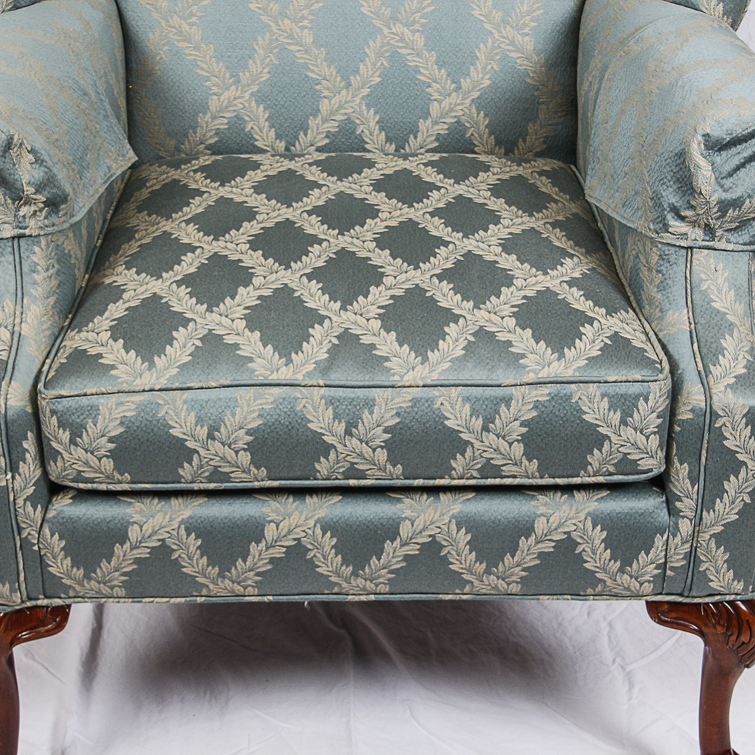 Blue Upholstered Wingback Chair and Ottoman