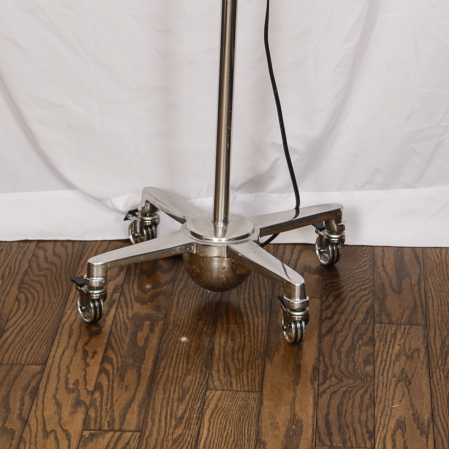 Chrome Swing Arm Floor Task Lamp with Castor Base