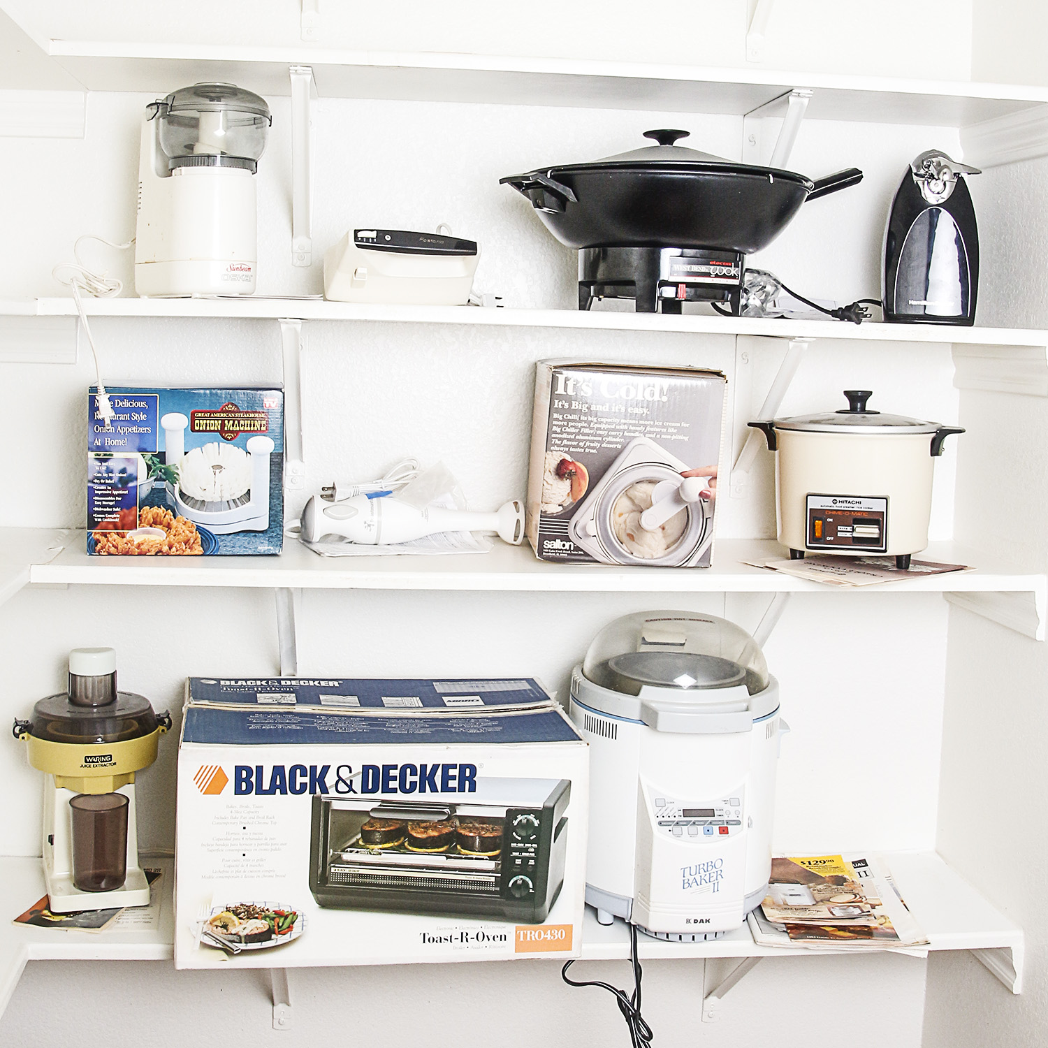 Small Kitchen Appliances including a Toaster Oven, Bread Maker, and Electric Wok