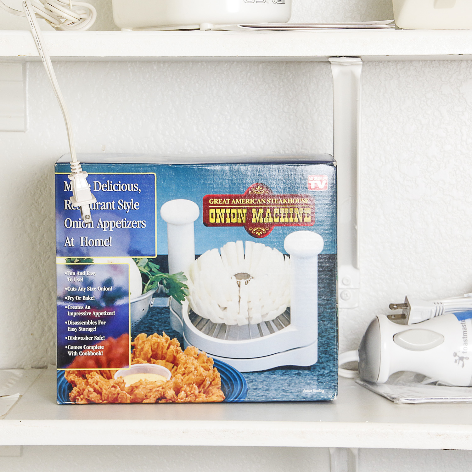 Small Kitchen Appliances including a Toaster Oven, Bread Maker, and Electric Wok