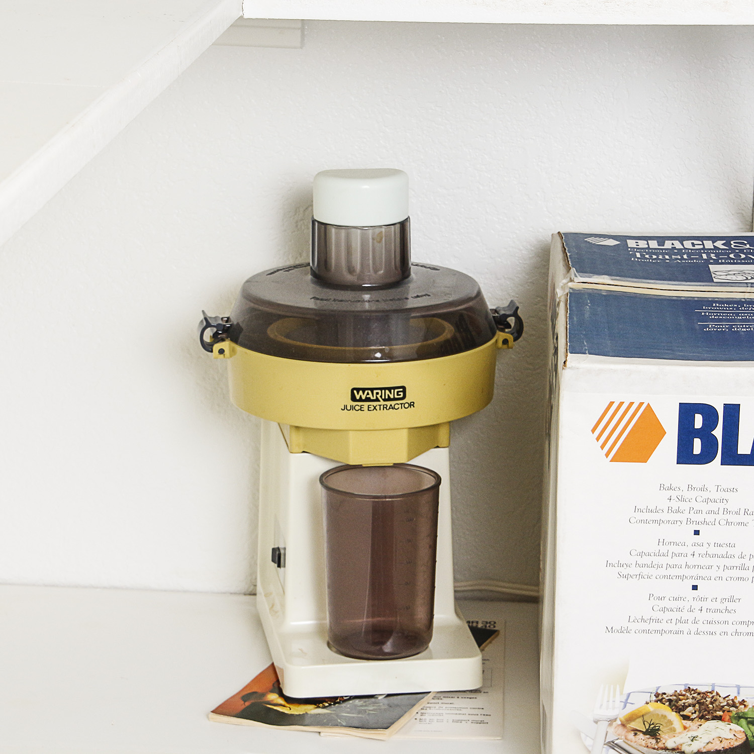 Small Kitchen Appliances including a Toaster Oven, Bread Maker, and Electric Wok
