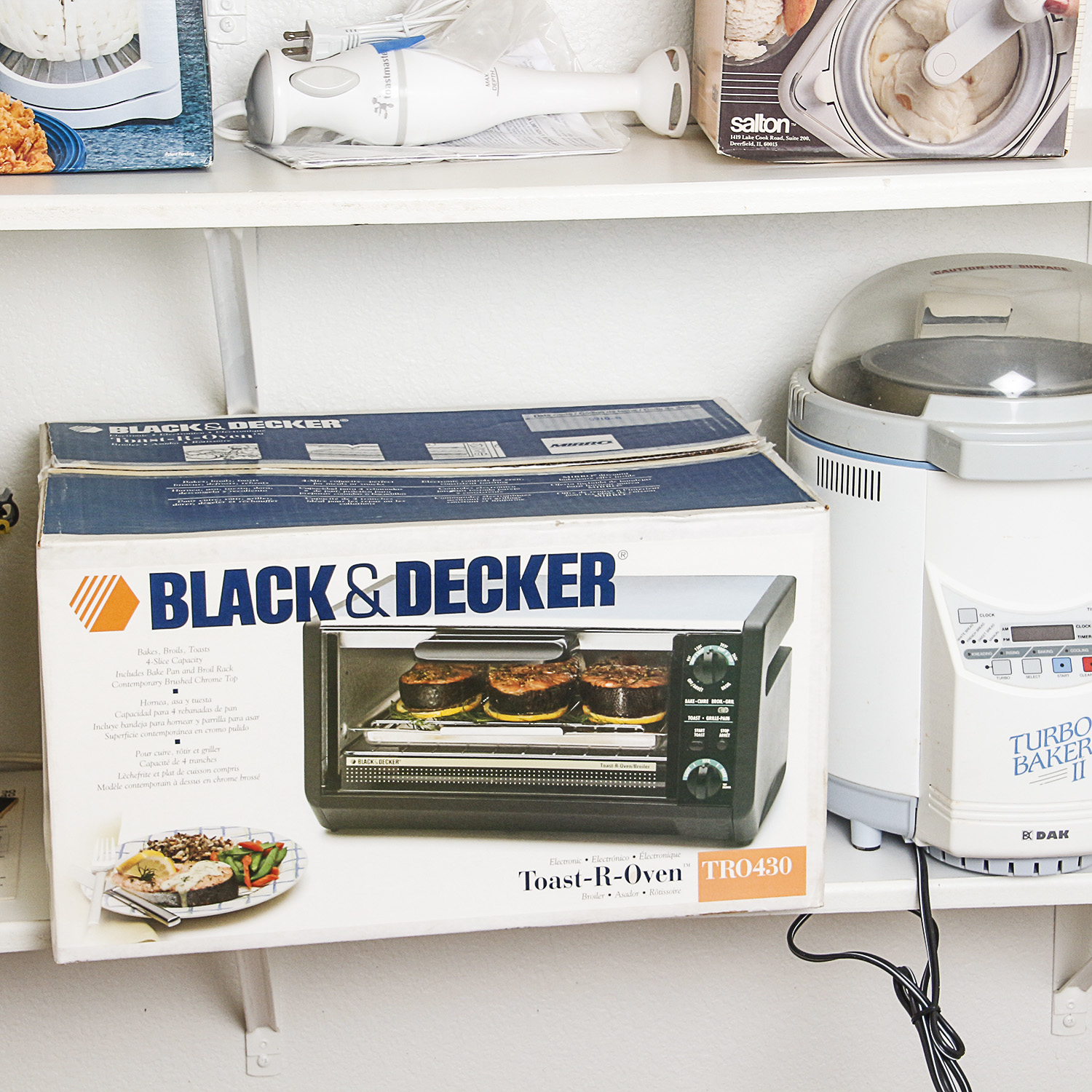 Small Kitchen Appliances including a Toaster Oven, Bread Maker, and Electric Wok