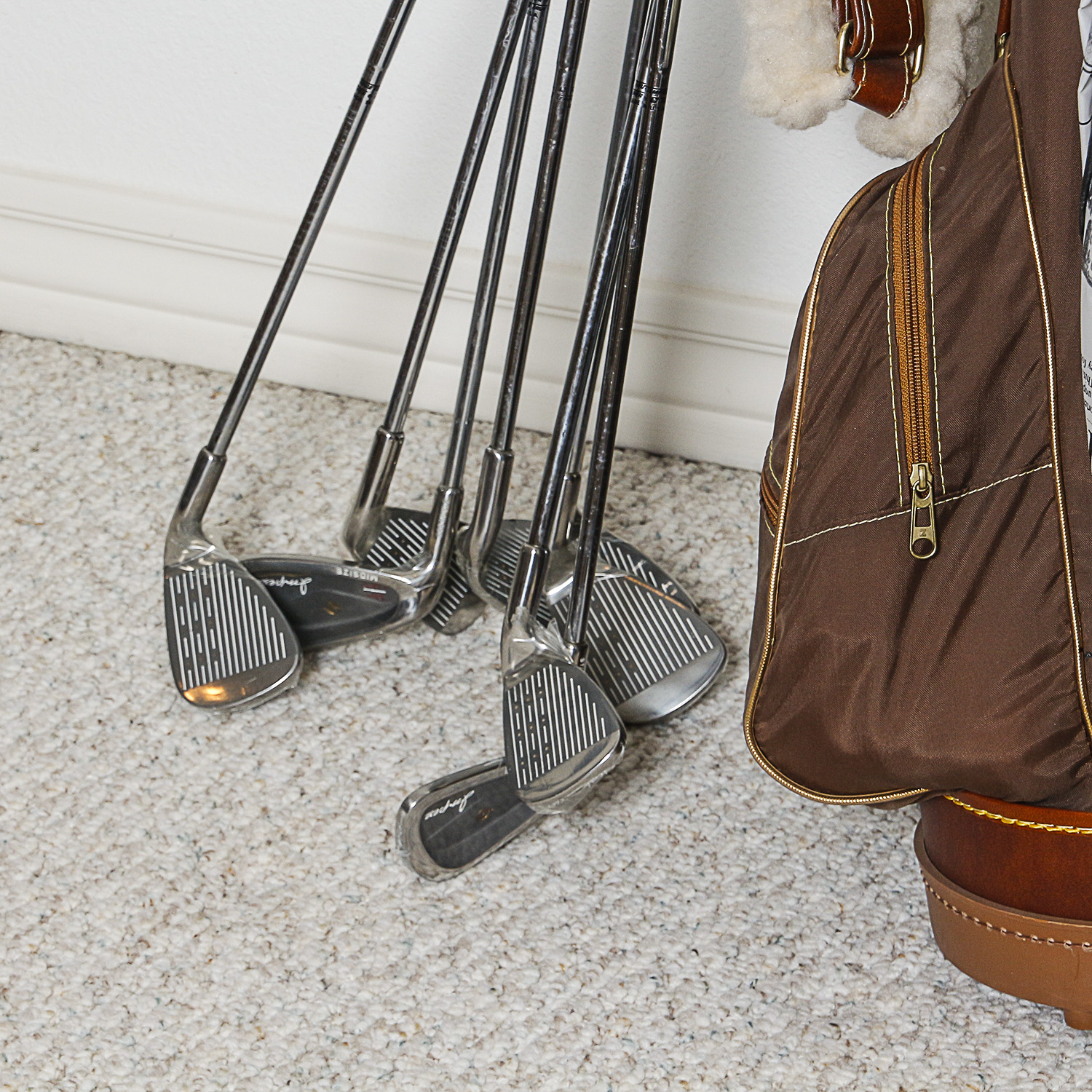 Golf Clubs, Bag and Birdie Putting Center