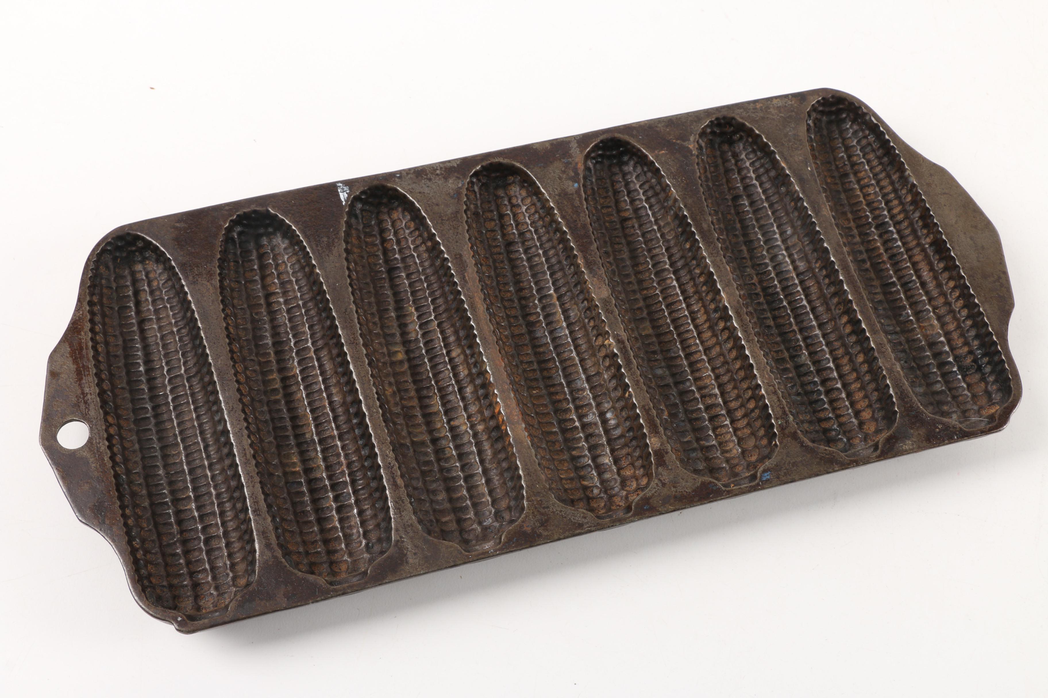 Vintage Cast Iron Griswold Corn Stick Pan and Duck Boot Scraper Door Stop