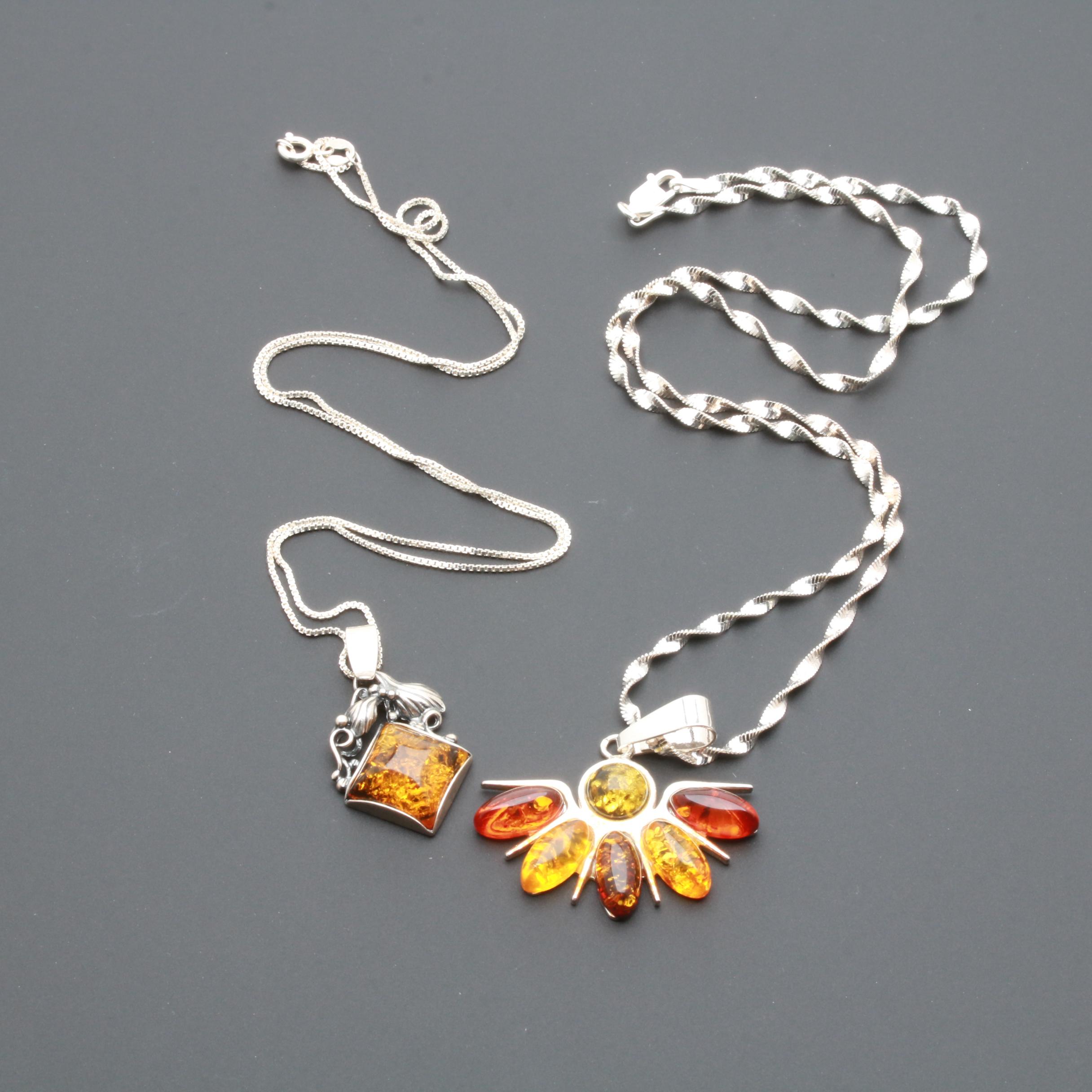 Sterling Silver Necklace and Earring Assortment Featuring Amber