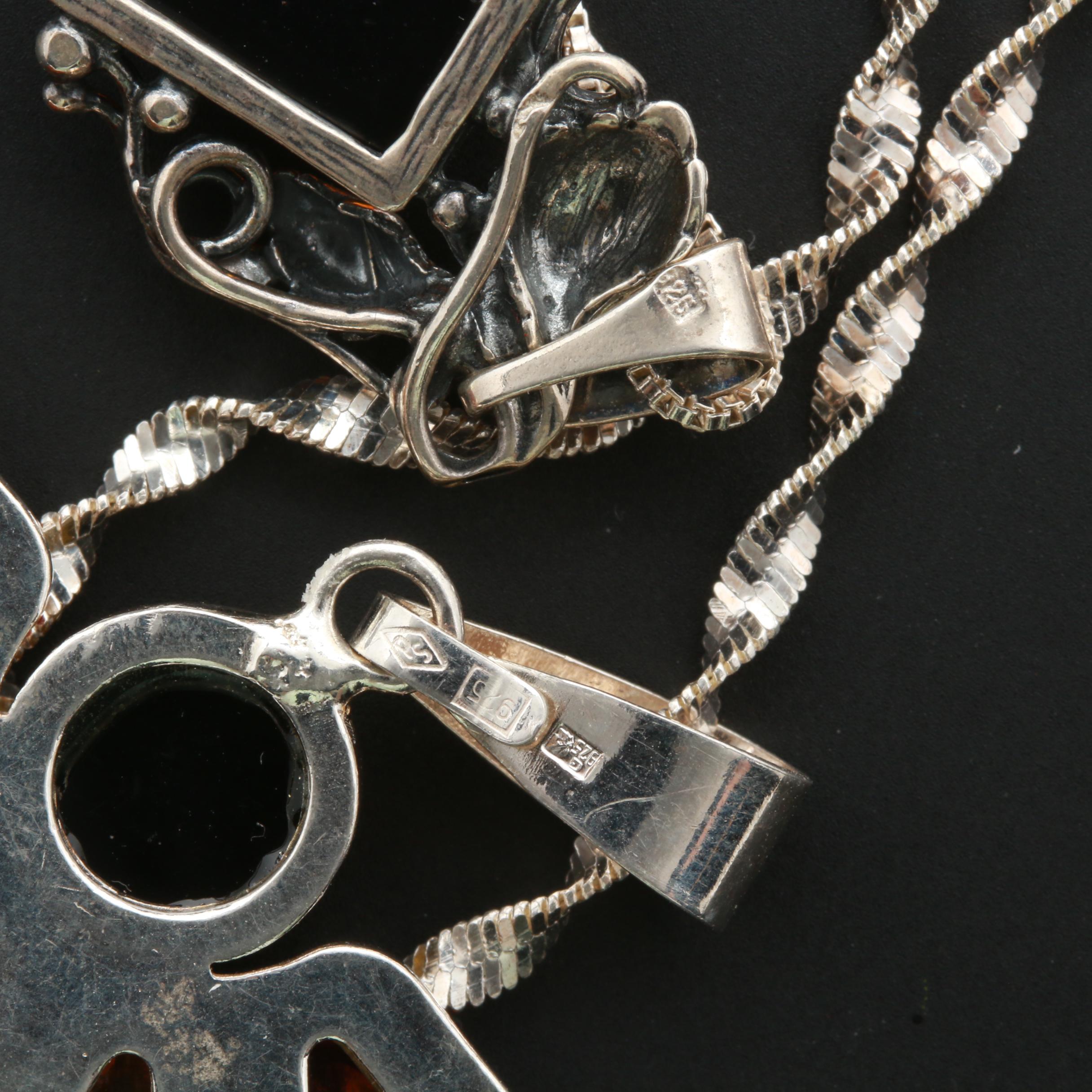 Sterling Silver Necklace and Earring Assortment Featuring Amber