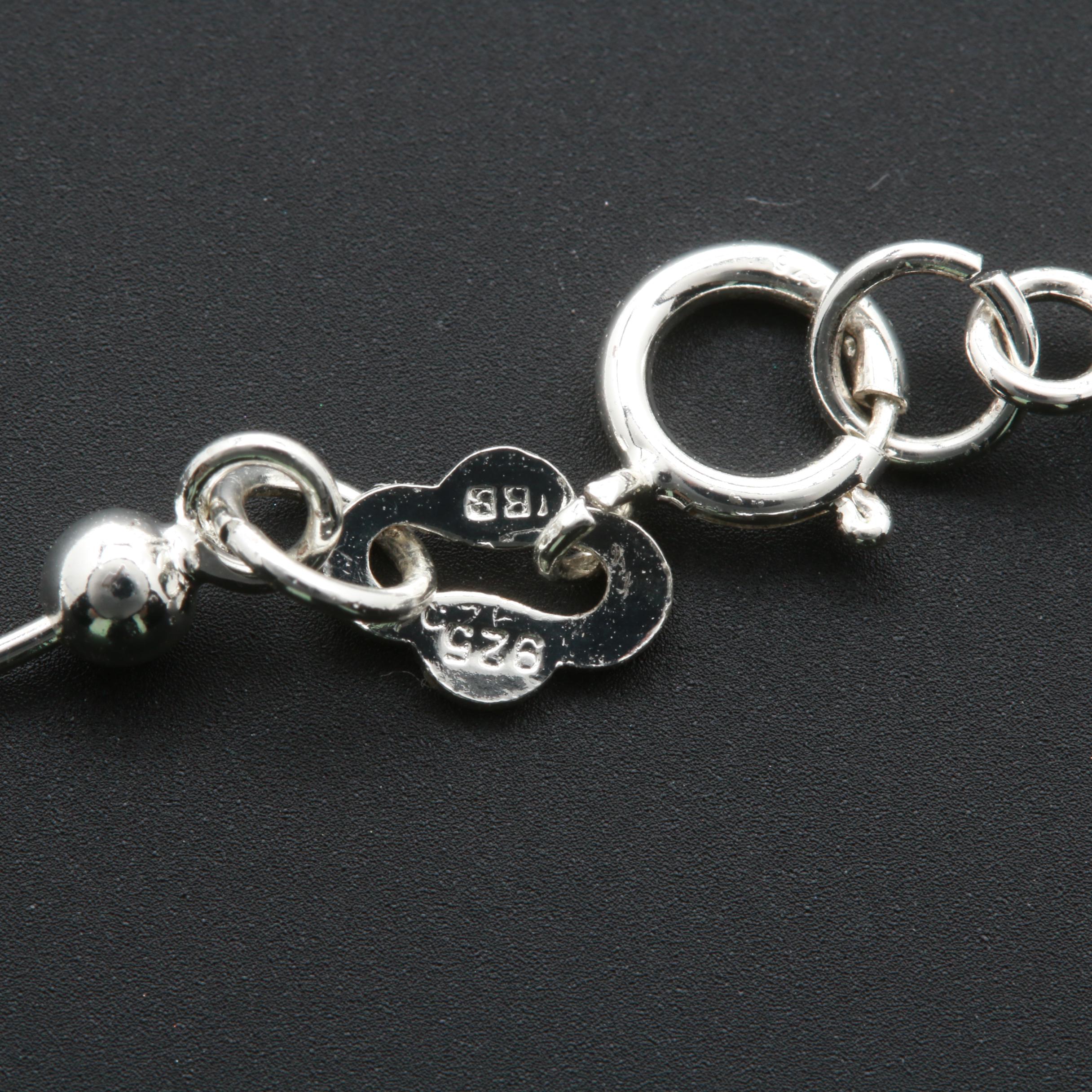 Sterling Silver Necklace and Earring Assortment Featuring Amber