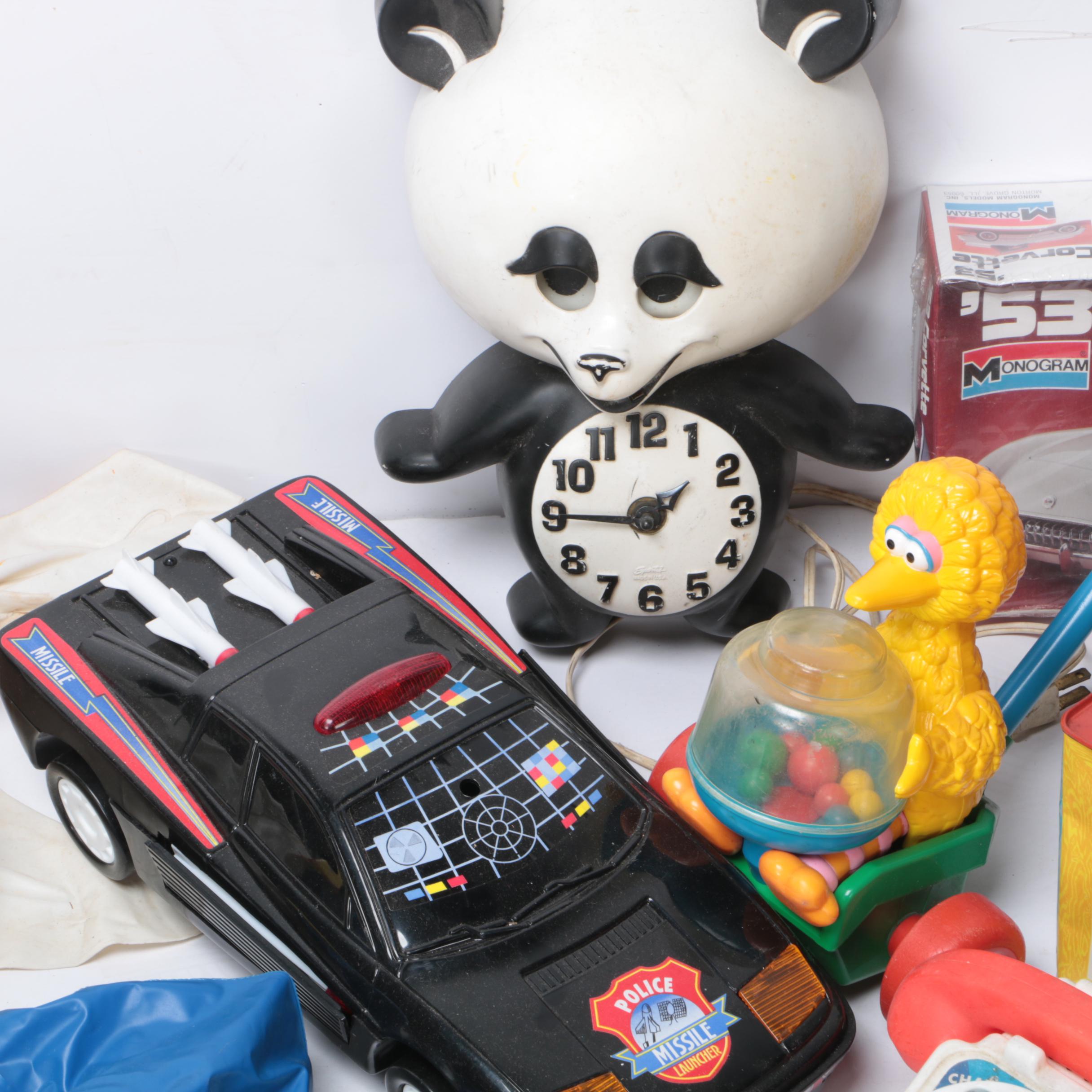 Vintage Toy Collection Including Model Kits, Fisher Price Phone, and More