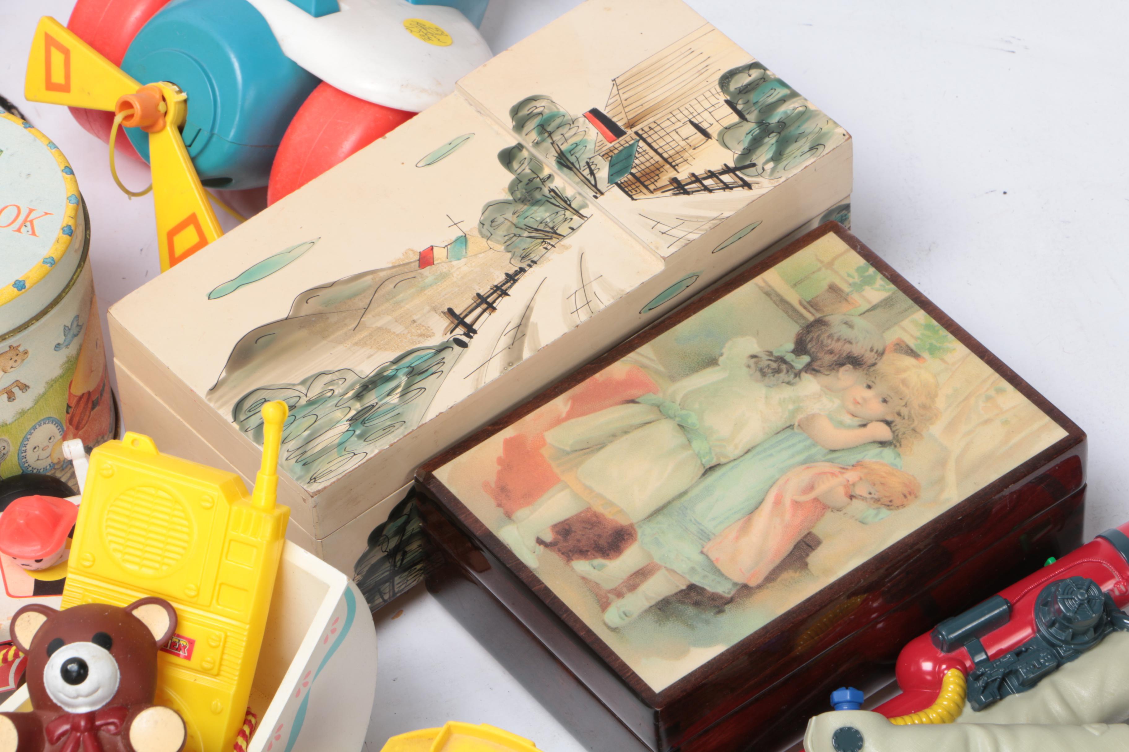 Vintage Toy Collection Including Model Kits, Fisher Price Phone, and More