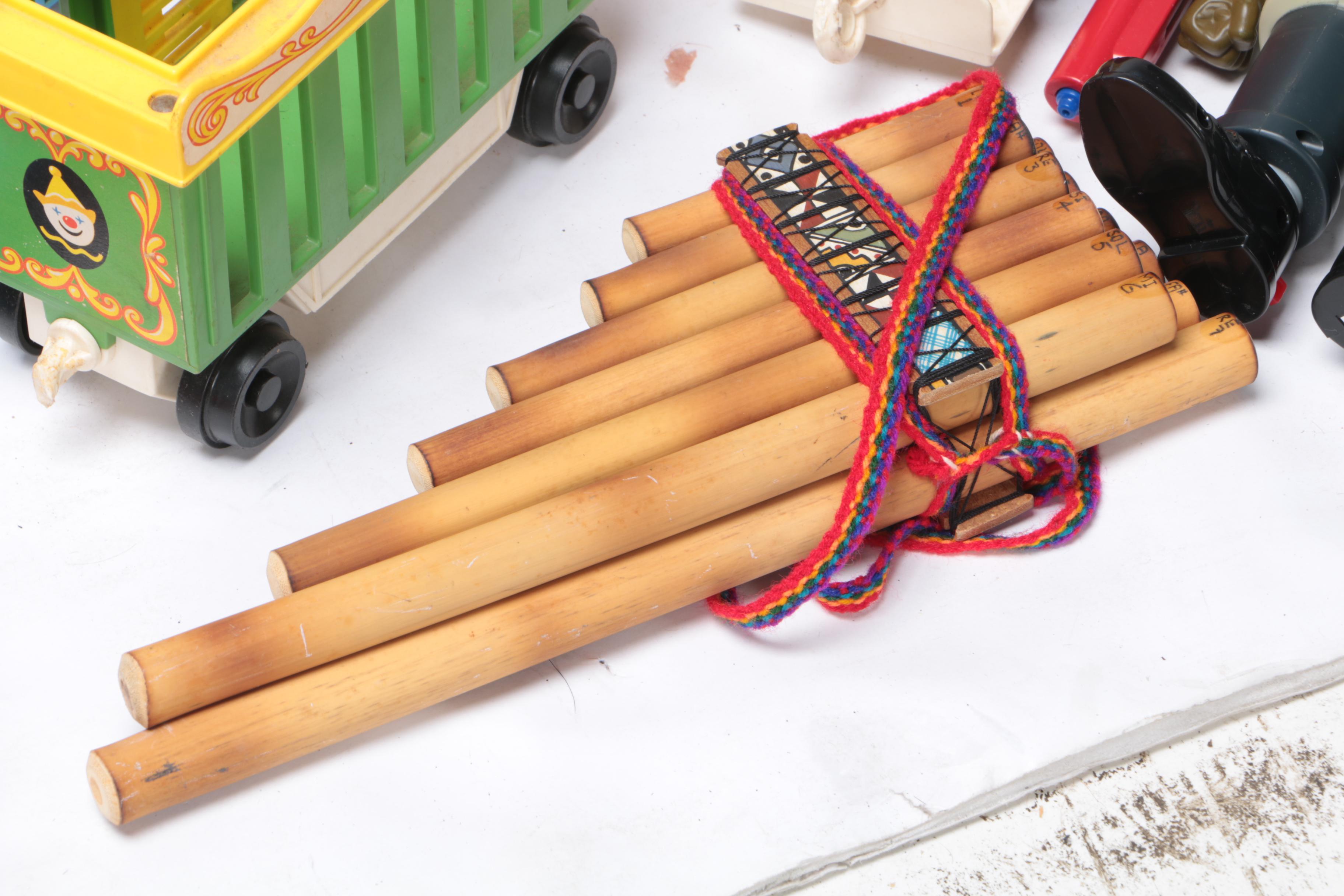 Vintage Toy Collection Including Model Kits, Fisher Price Phone, and More