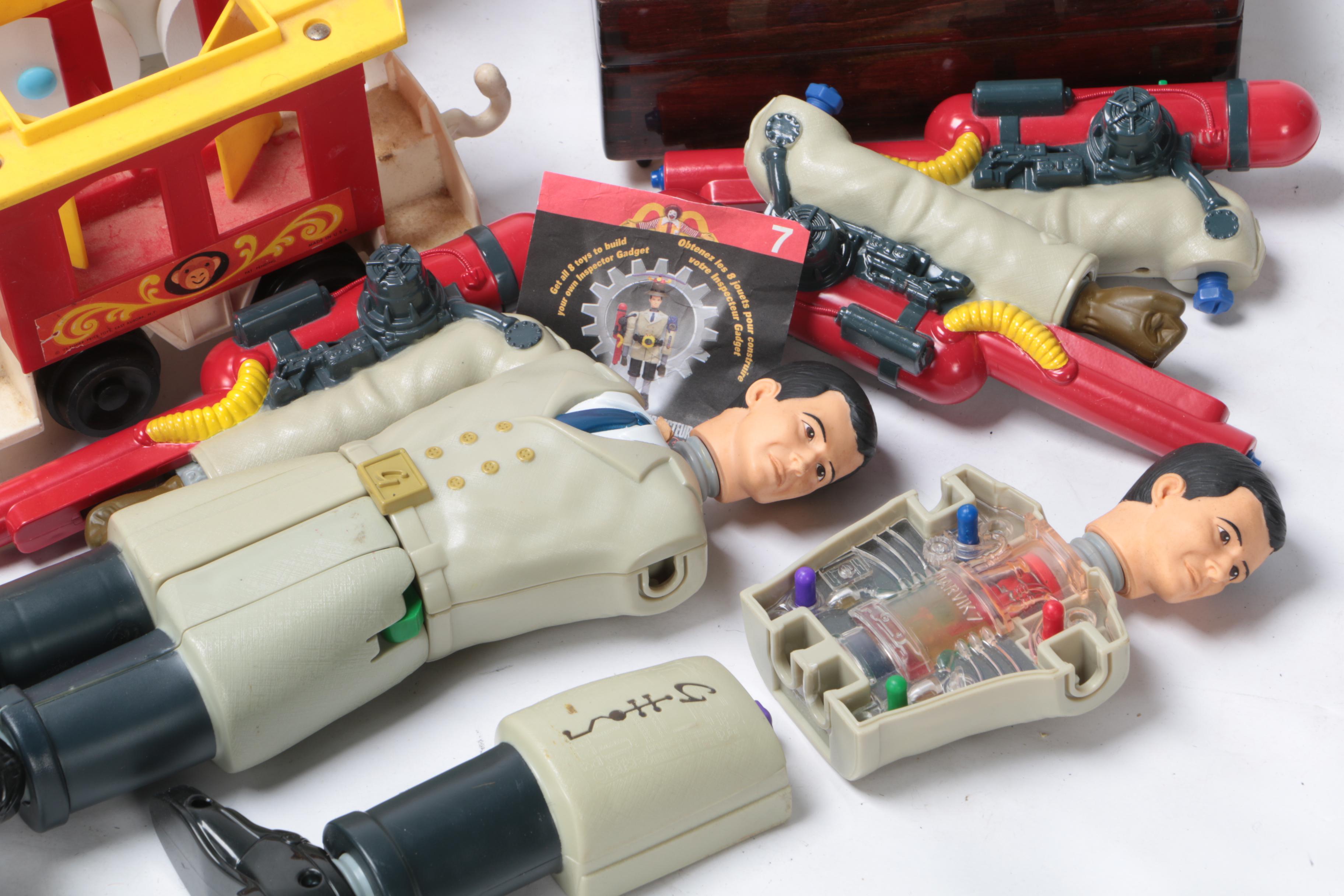 Vintage Toy Collection Including Model Kits, Fisher Price Phone, and More