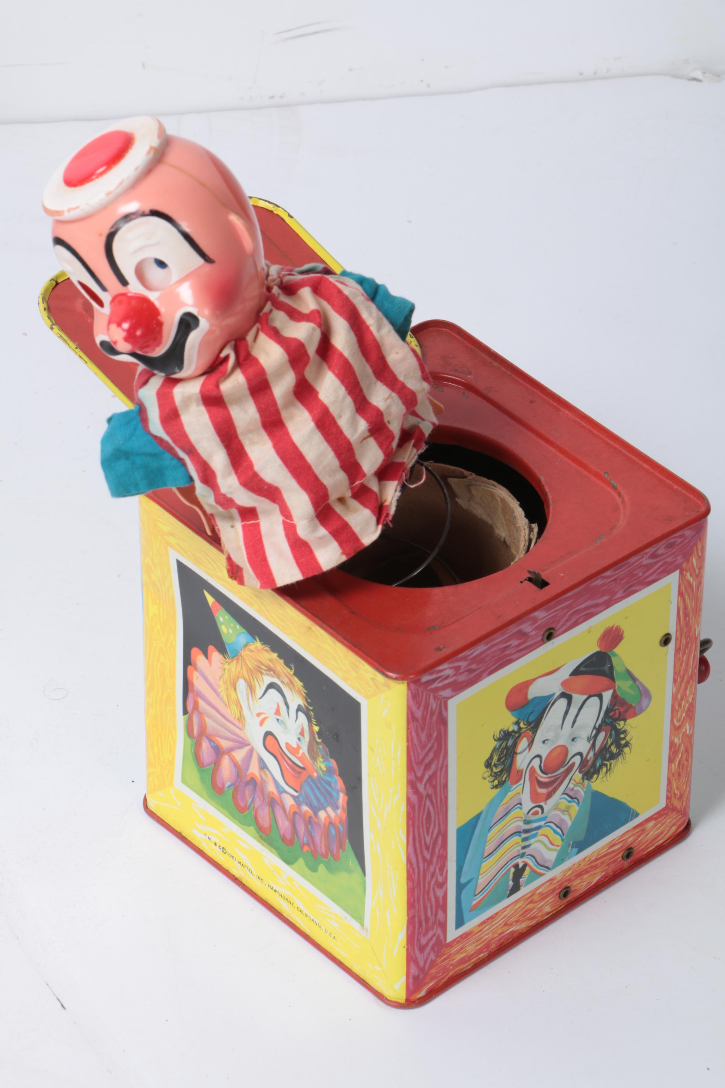 Vintage Toy Collection Including Model Kits, Fisher Price Phone, and More