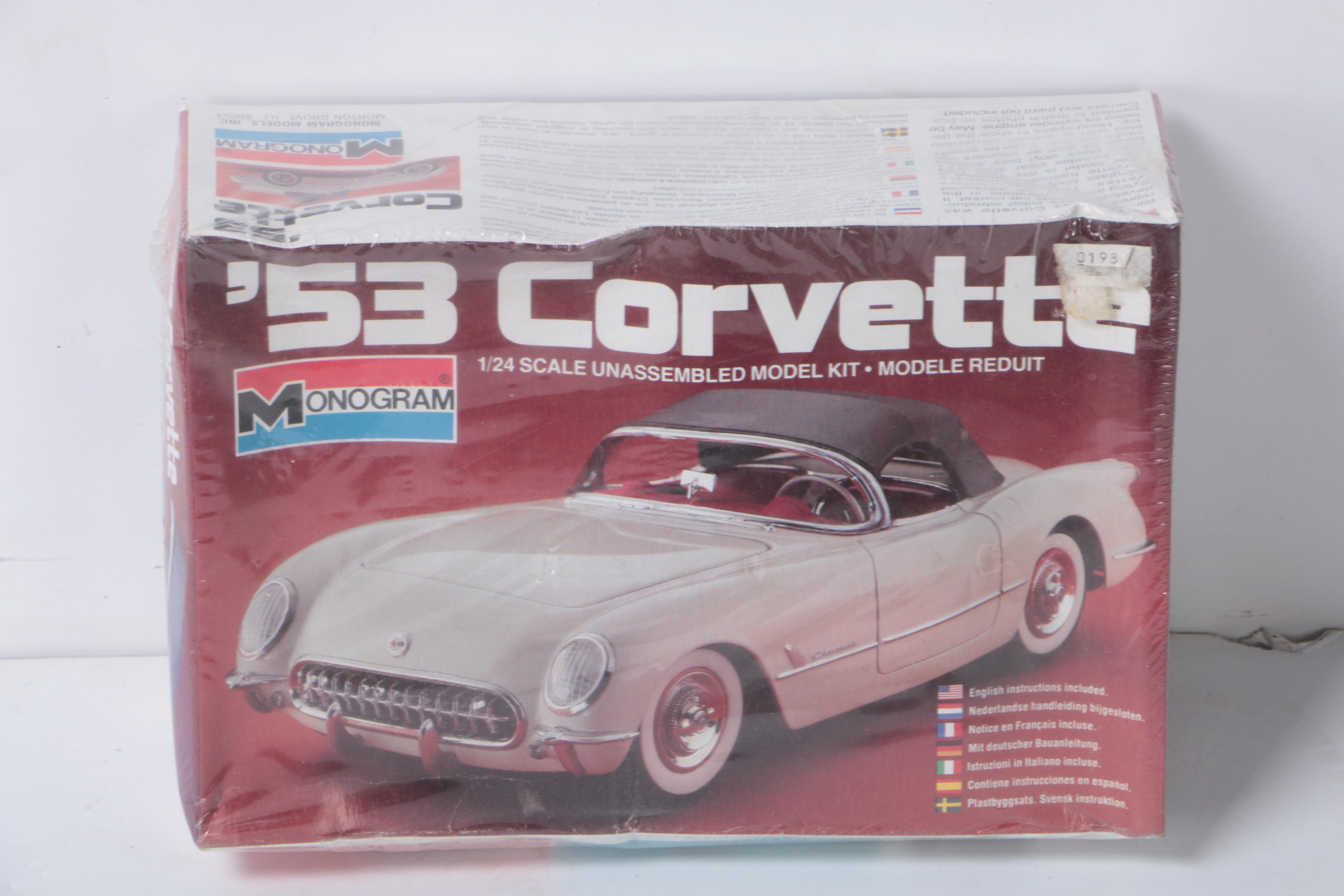 Vintage Toy Collection Including Model Kits, Fisher Price Phone, and More