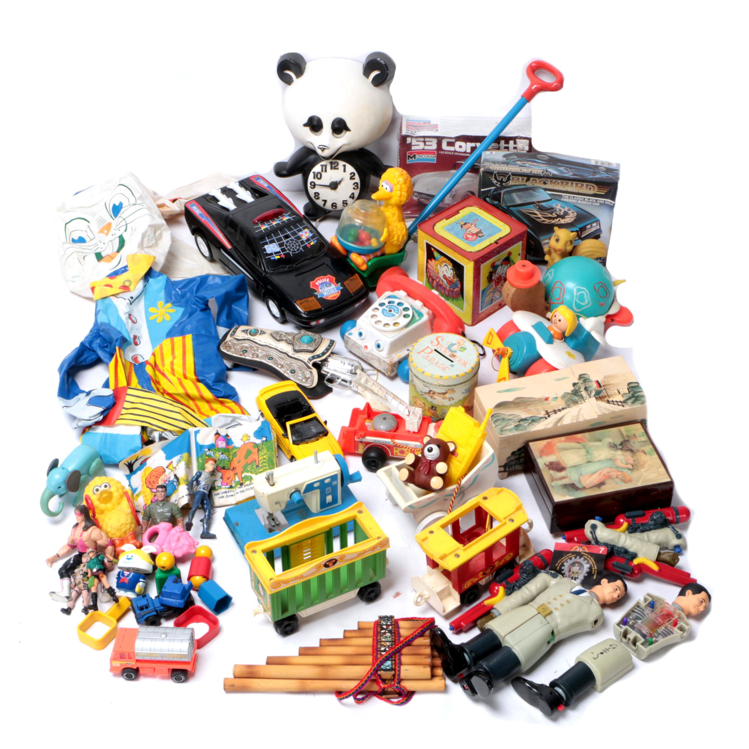 Vintage Toy Collection Including Model Kits, Fisher Price Phone, and More