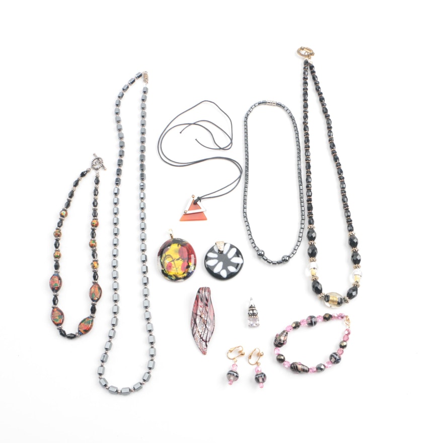 Assortment of Jewelry Featuring Glass, Carnelian, and Hematite