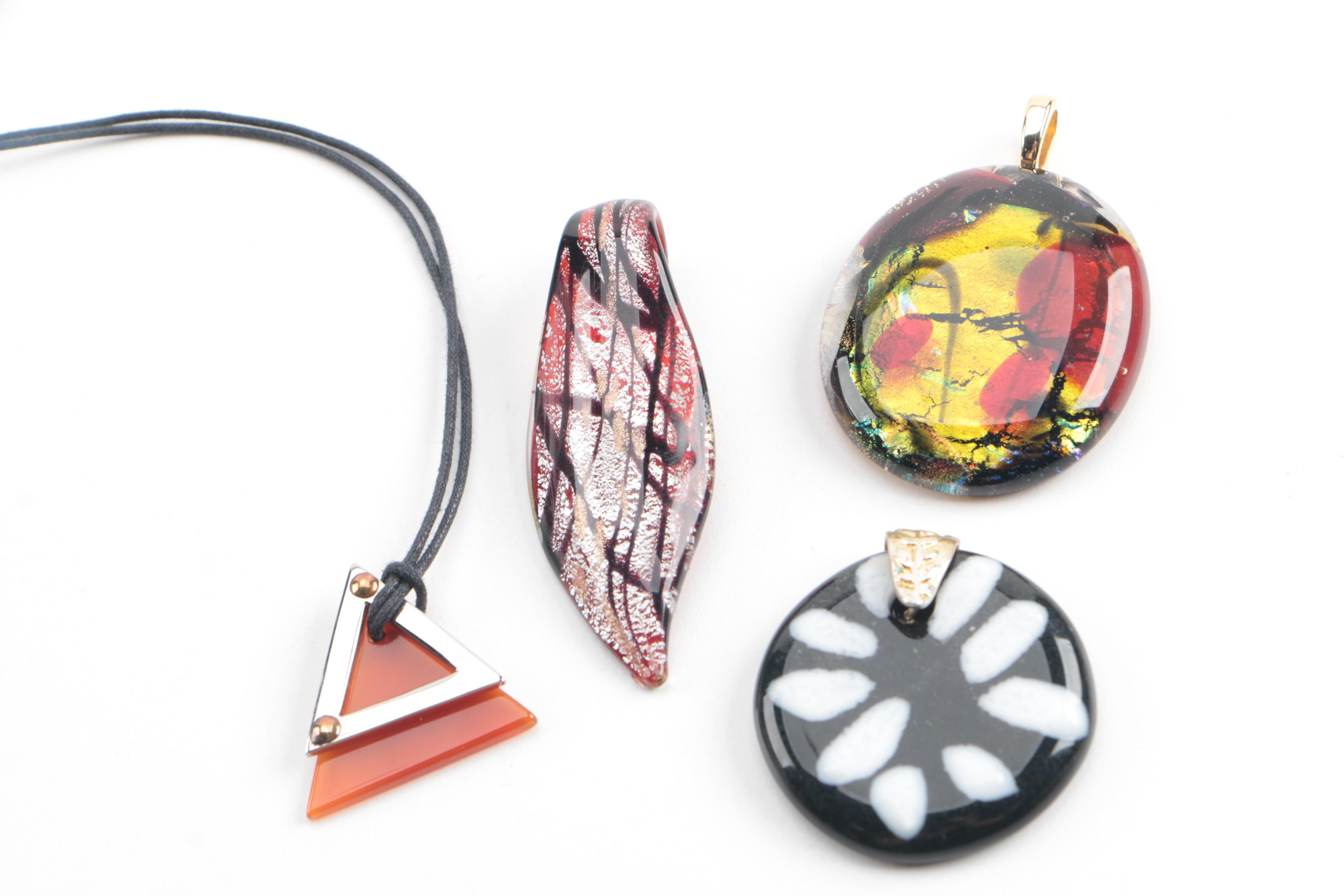 Assortment of Jewelry Featuring Glass, Carnelian, and Hematite