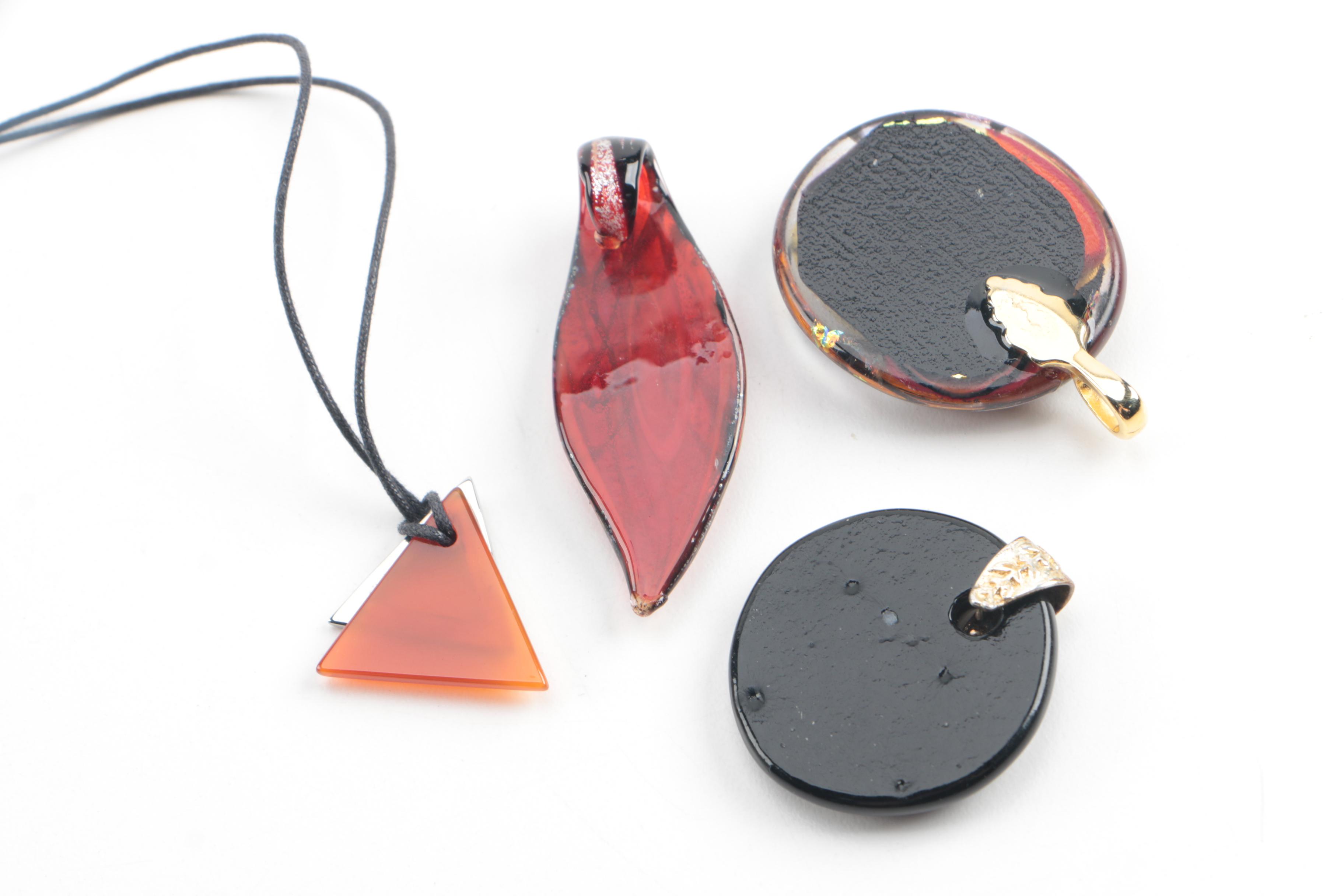 Assortment of Jewelry Featuring Glass, Carnelian, and Hematite