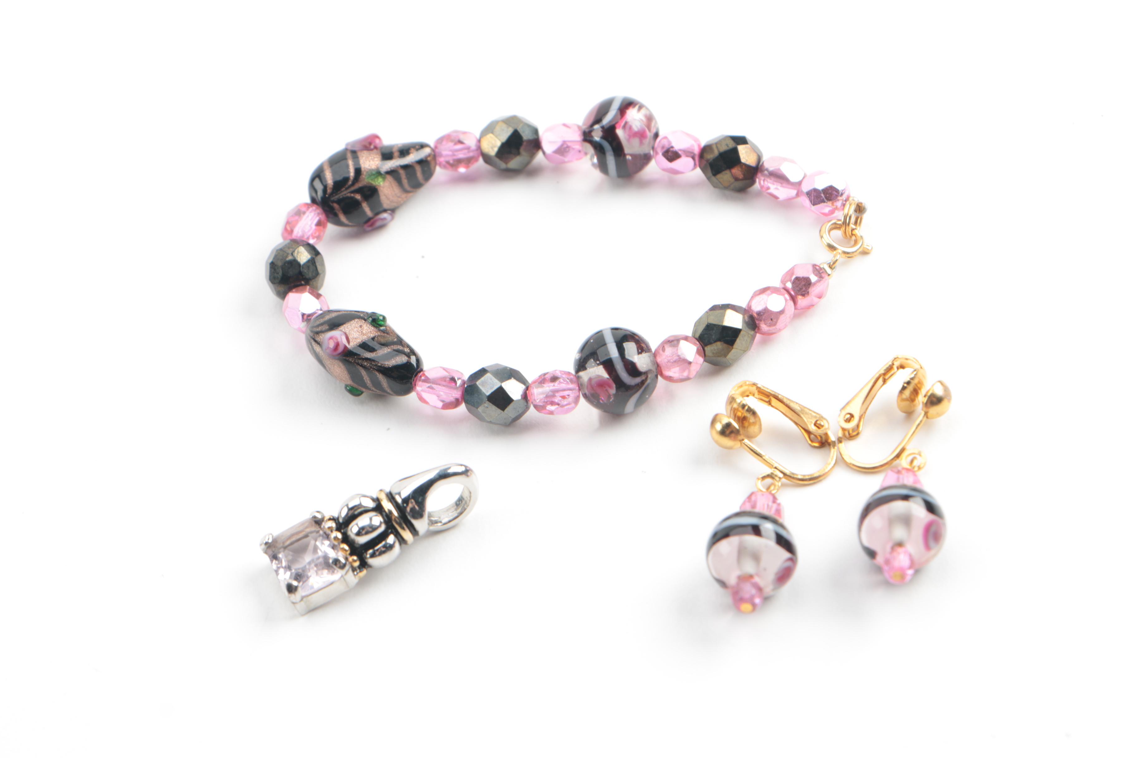 Assortment of Jewelry Featuring Glass, Carnelian, and Hematite