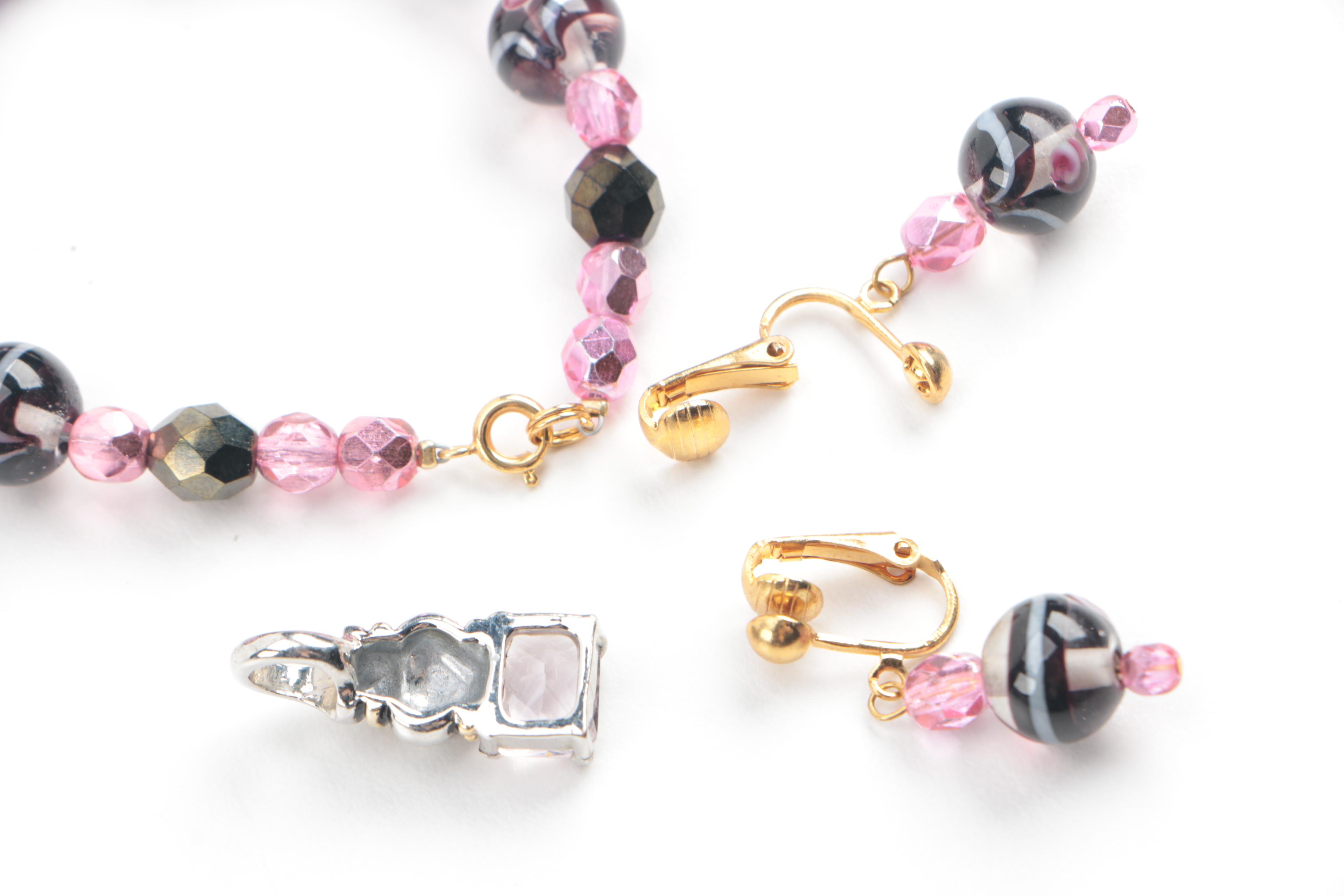 Assortment of Jewelry Featuring Glass, Carnelian, and Hematite