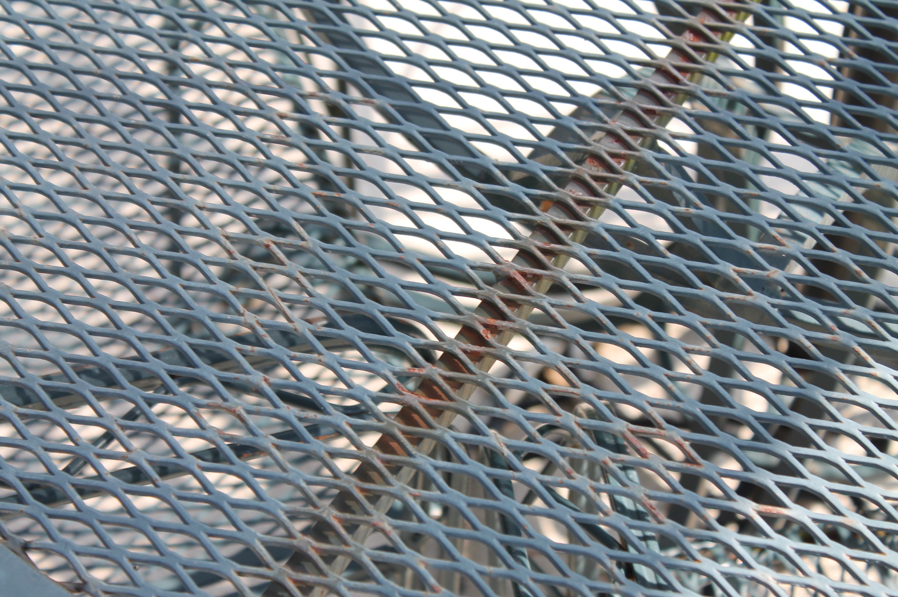 Bent Metal Patio Table and Chairs with Umbrella