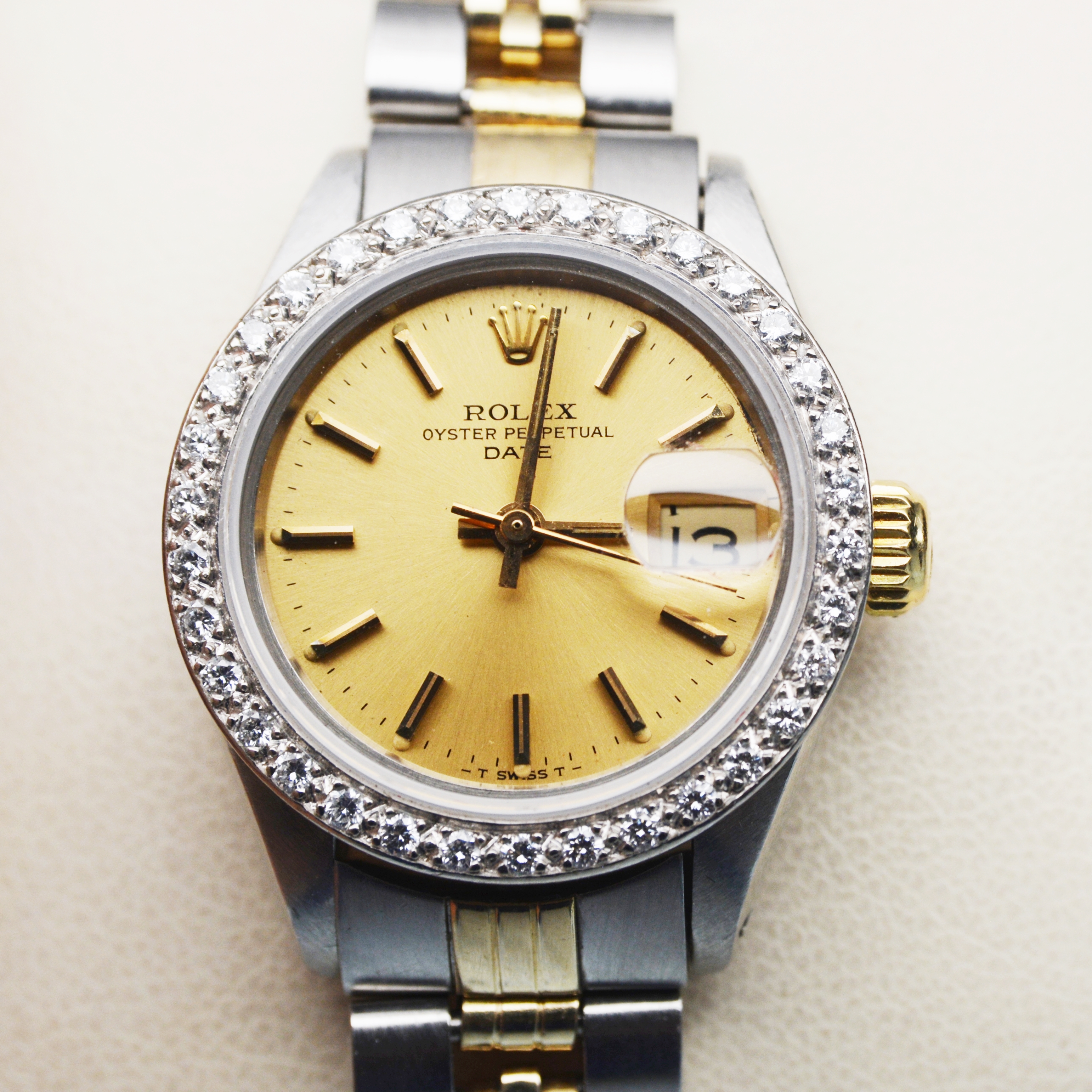 Rolex Oyster Perpetual Date Diamond Bezel Watch