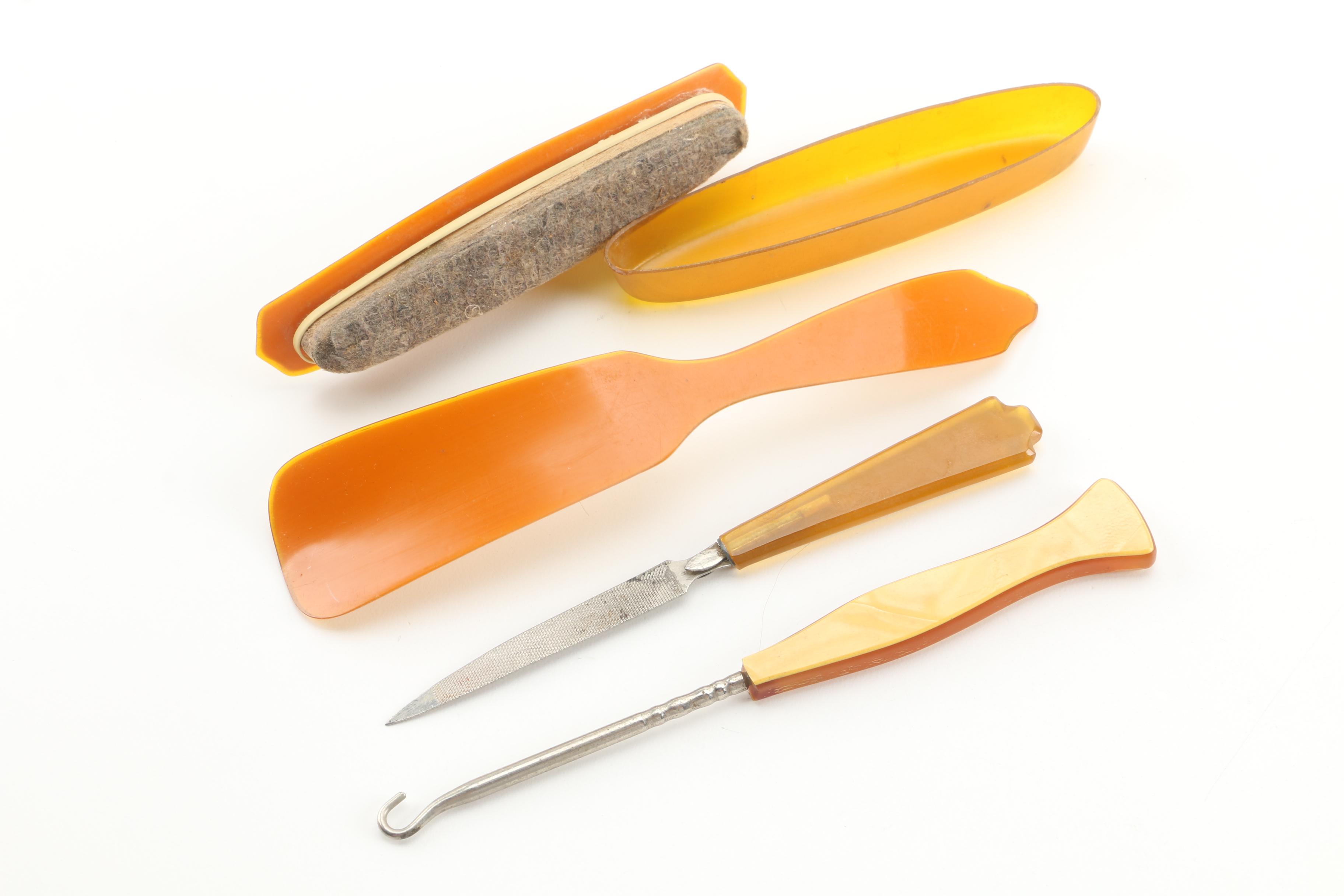 Vintage Seven-Piece Celluloid Vanity Set and Erphila Art Pottery Lidded Box