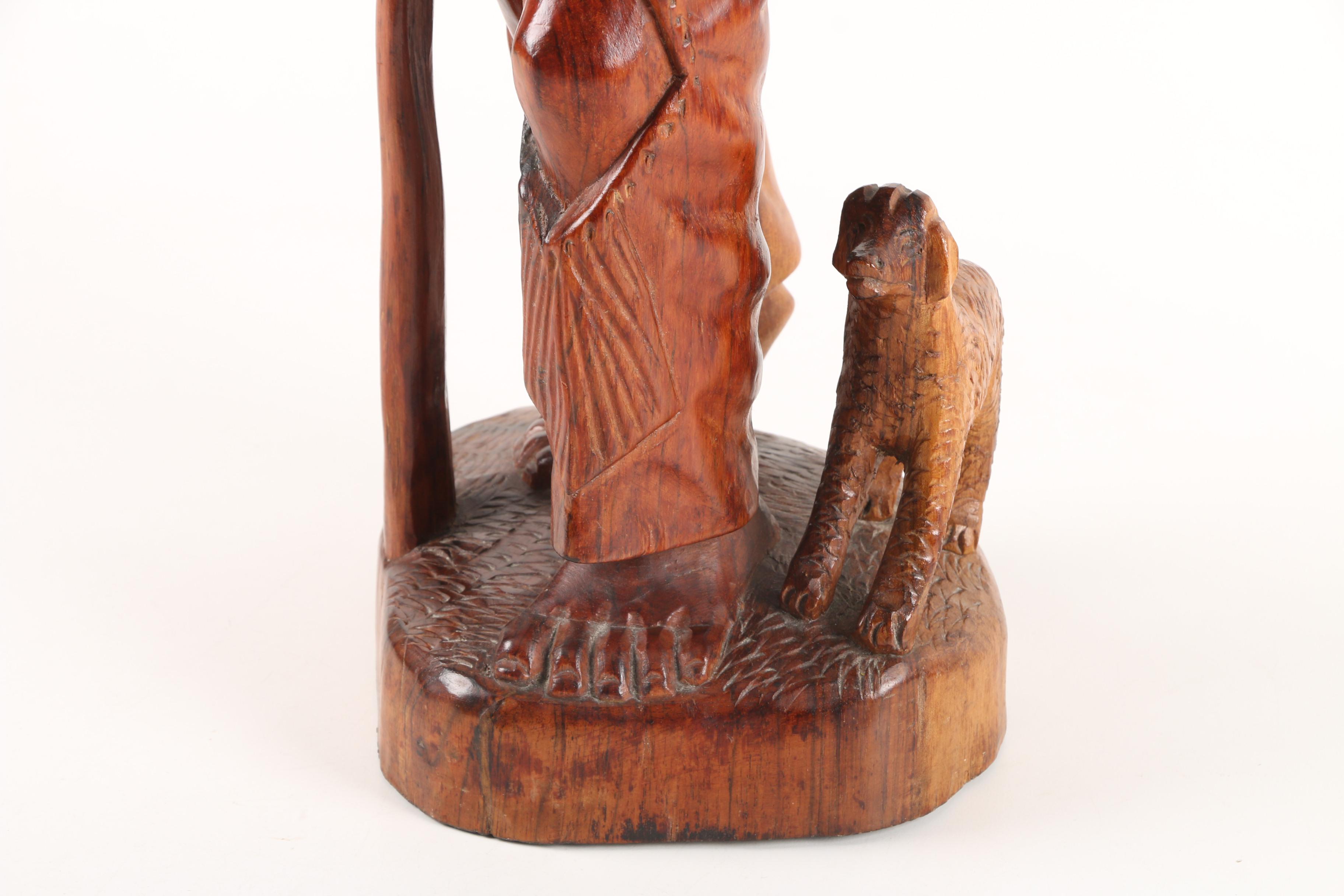 Carved Wood Sculpture of Mountain Man Walking with Dog