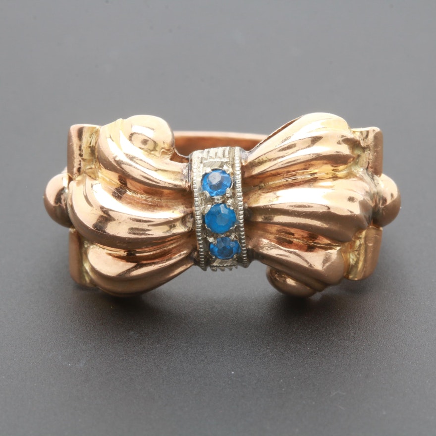 Retro Circa 1940s 18K Yellow and White Gold Synthetic Blue Spinel Bow Ring