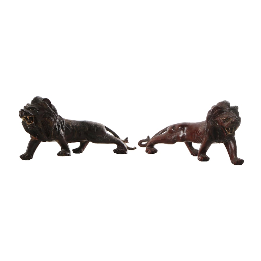 Carved Wooden Sculptures of Lions