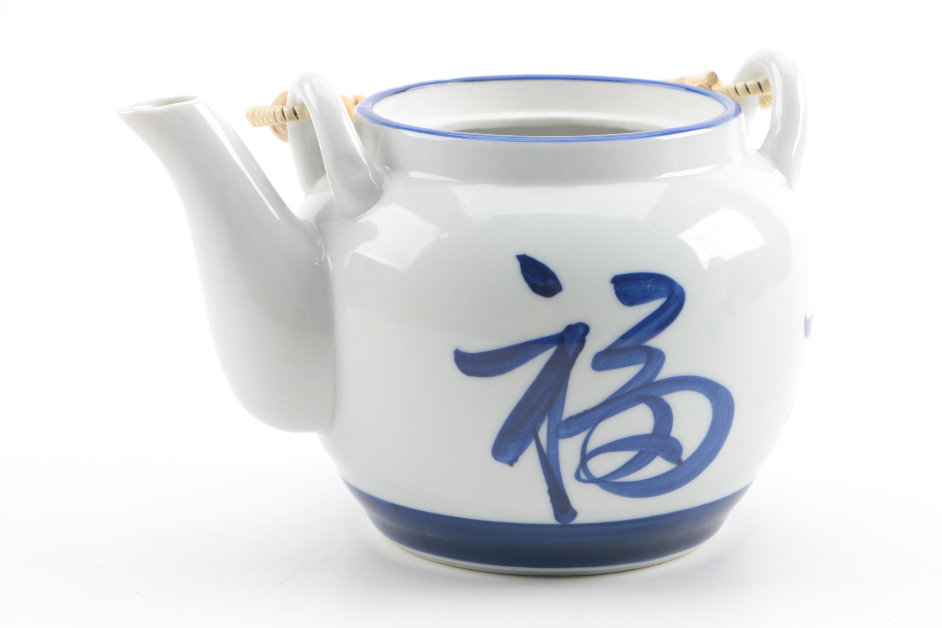 Chinese Inspired Ceramic Boy and Fish Figurine with Japanese Teapot