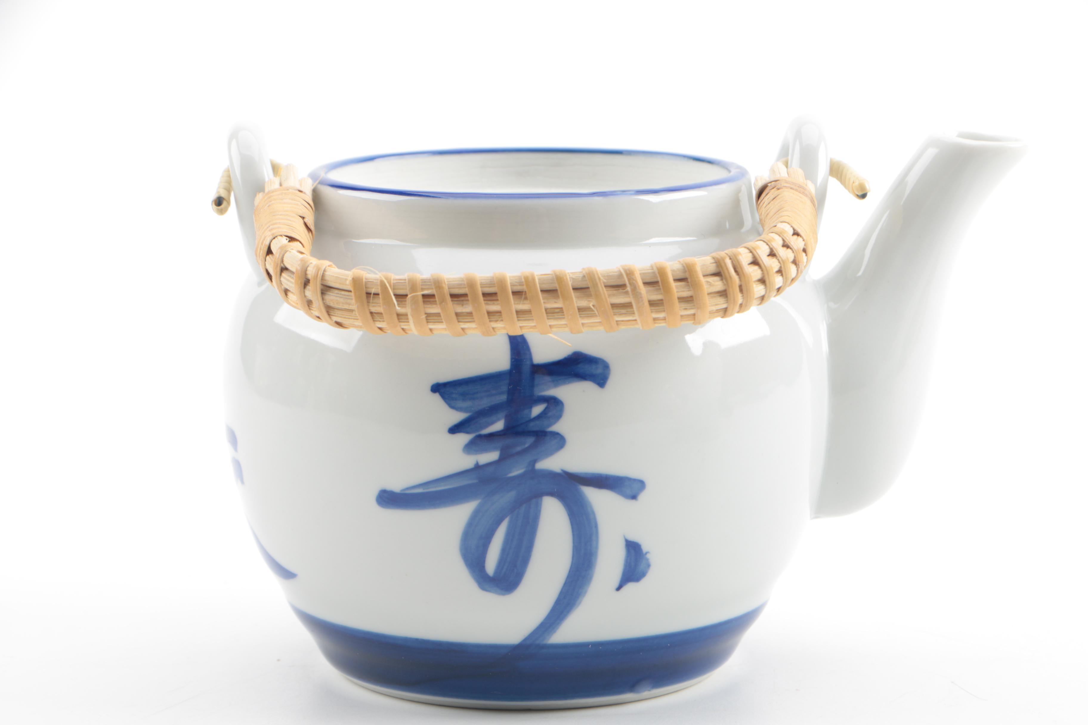 Chinese Inspired Ceramic Boy and Fish Figurine with Japanese Teapot