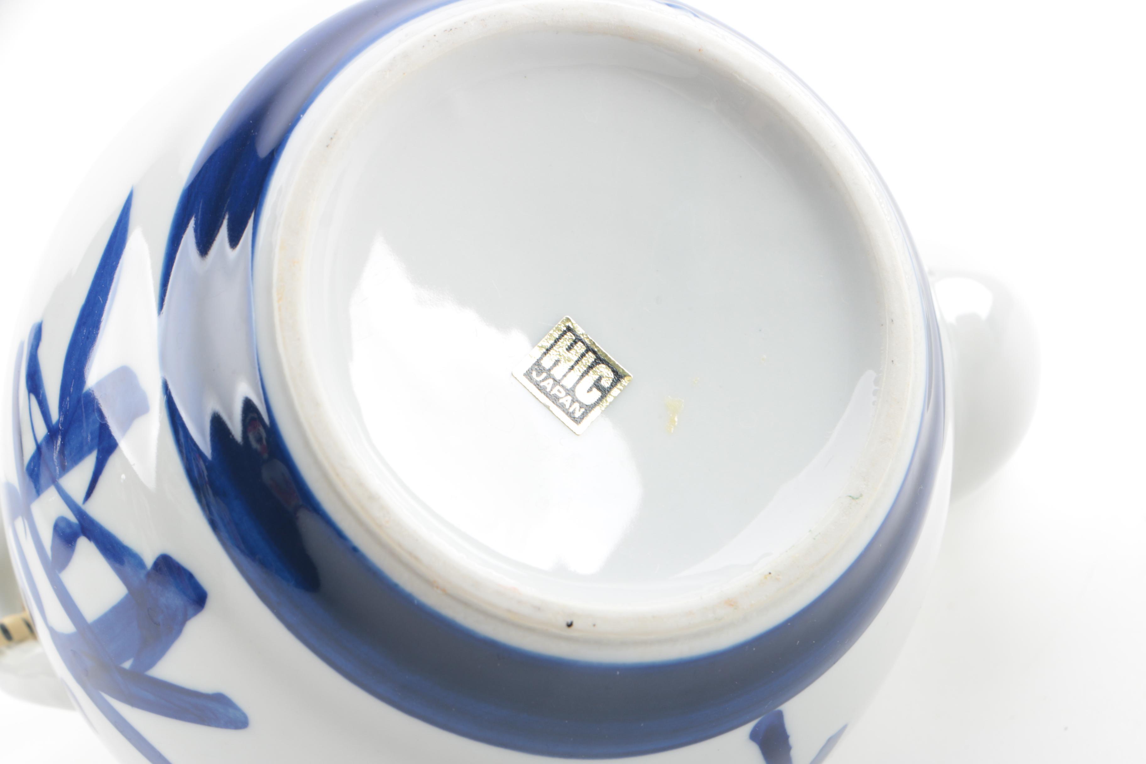 Chinese Inspired Ceramic Boy and Fish Figurine with Japanese Teapot