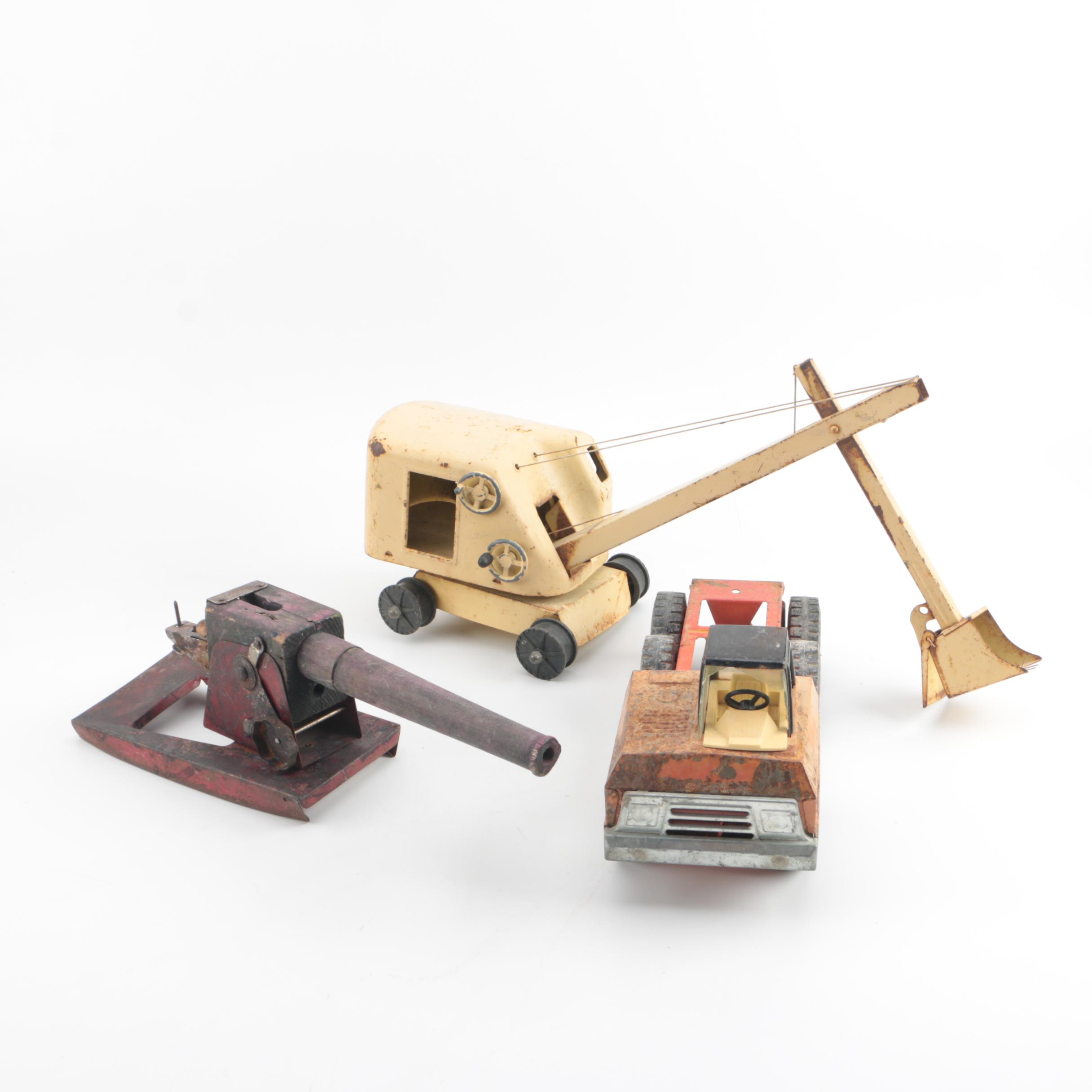 Vintage Pressed Steel Construction Equipment and Cannon Including Nylint