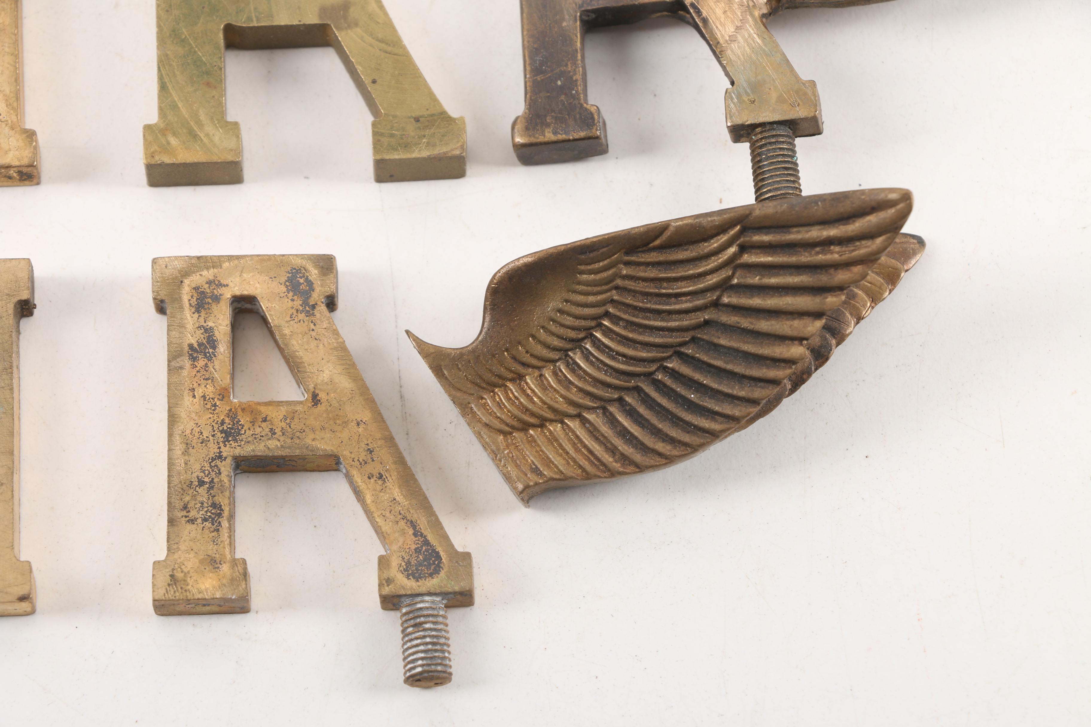 Metal Wing and "A" Ornaments