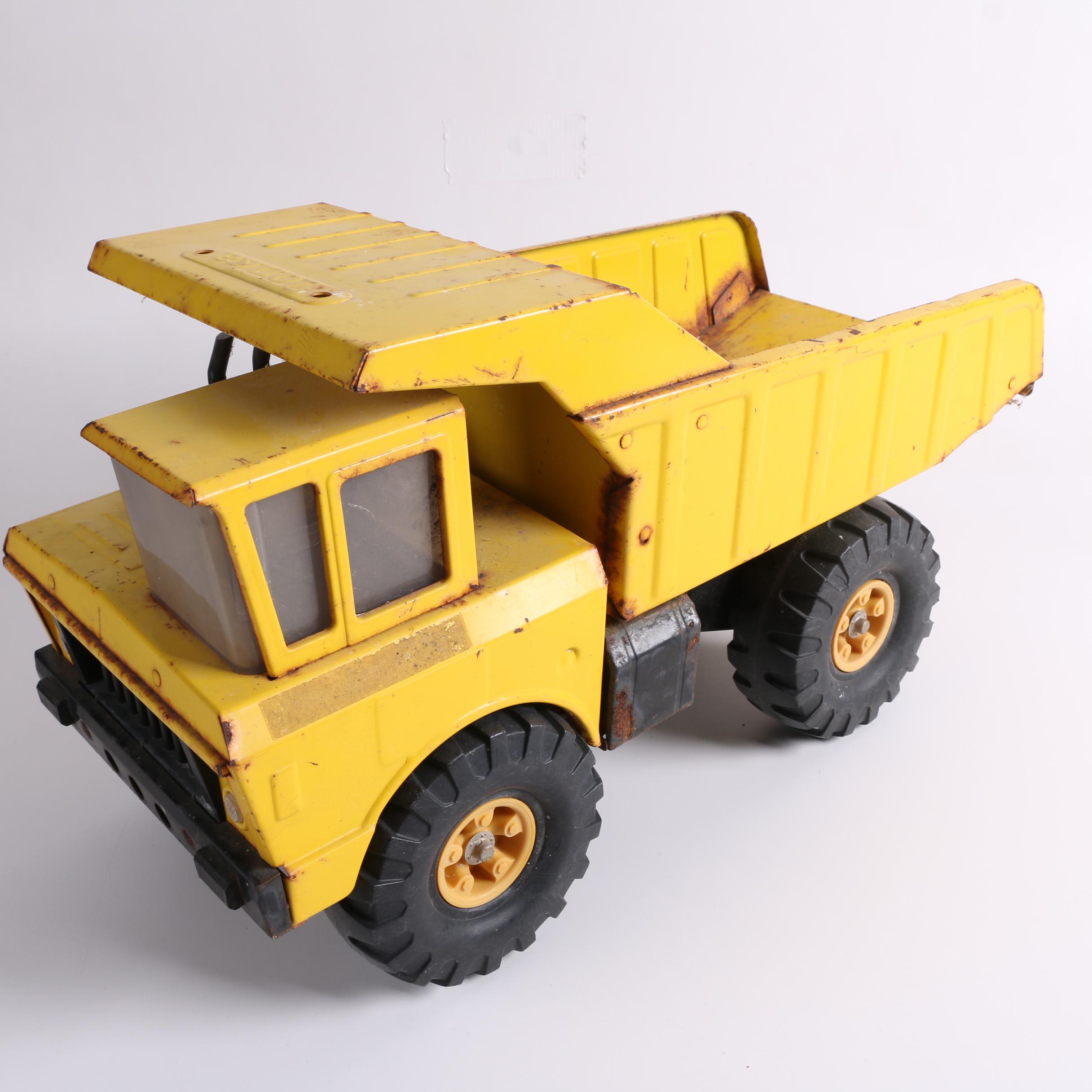 Vintage Tonka Dump Truck, Hubley Trailer, and Cypress Kness