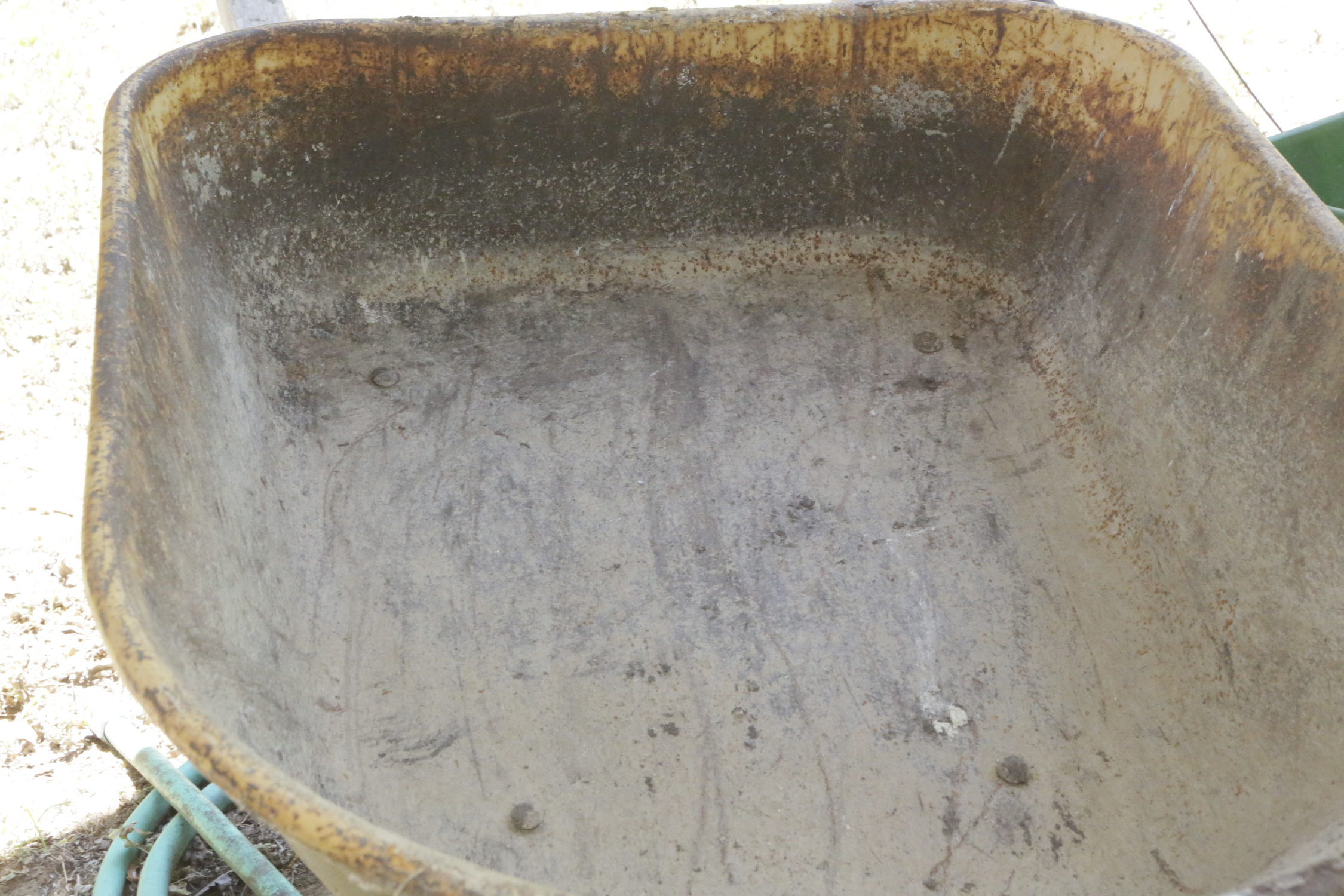 Wheel Barrow, String Trimmer and Scotts Broadcast Spreader