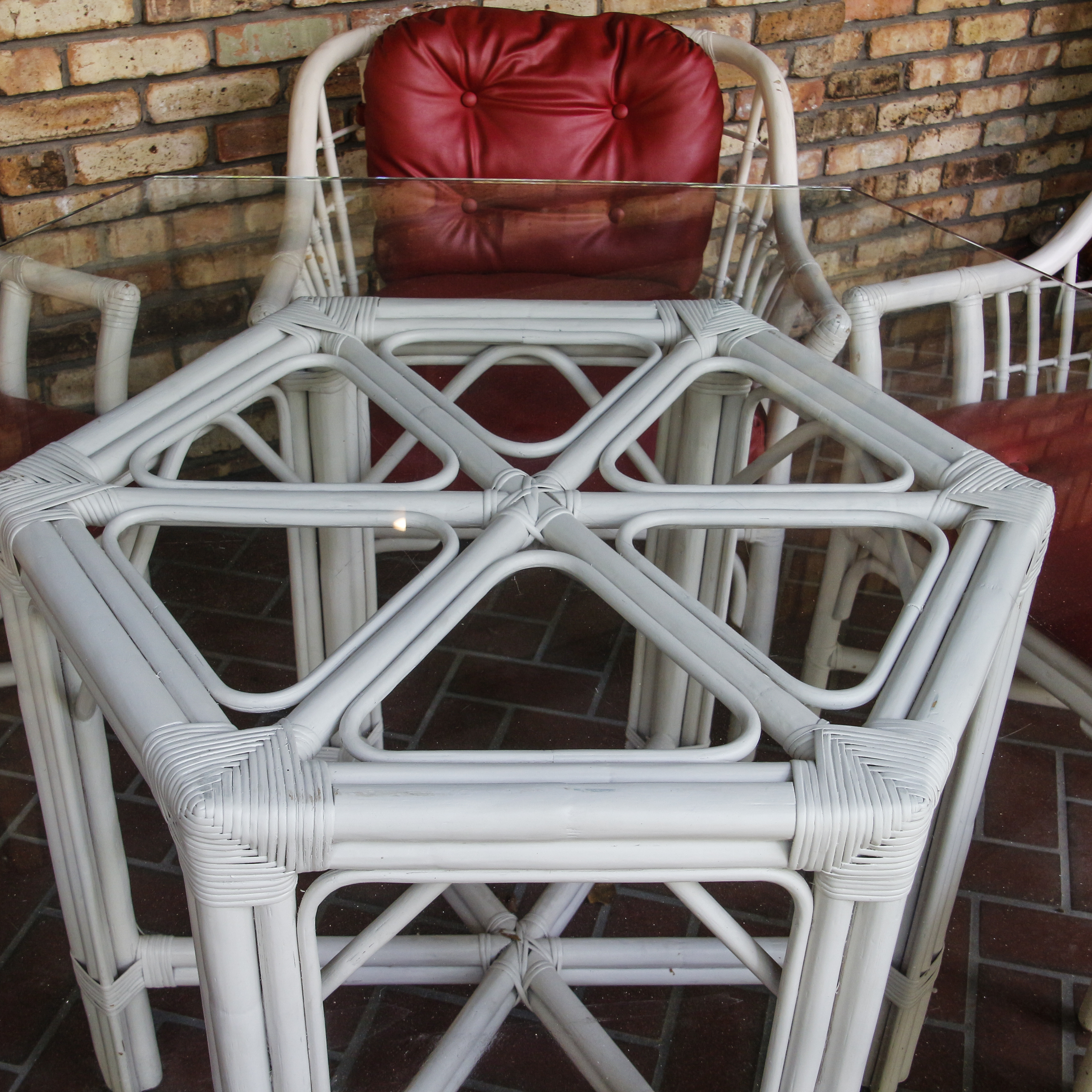 Glass Top Patio Table with White Painted Rattan Armchairs