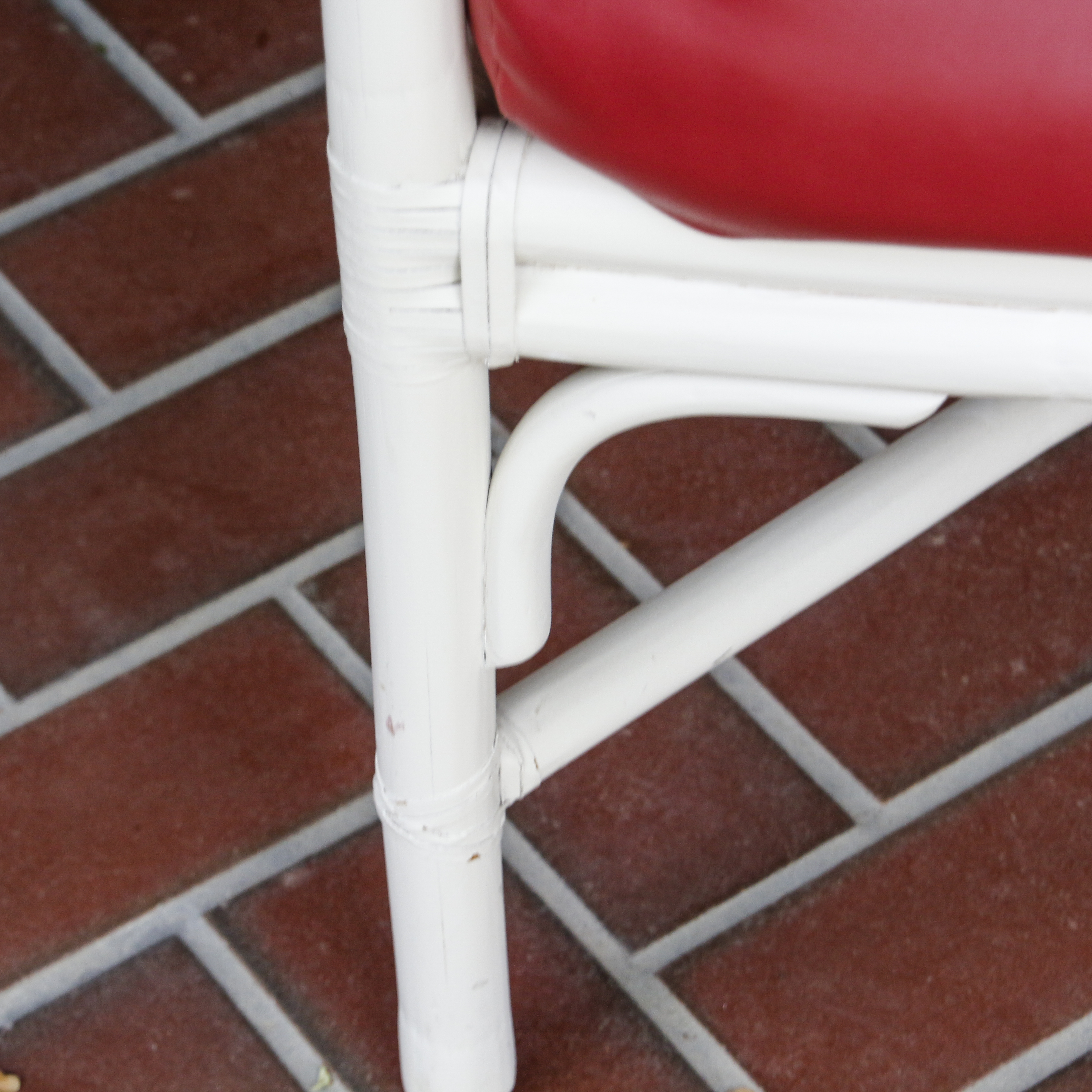 Glass Top Patio Table with White Painted Rattan Armchairs